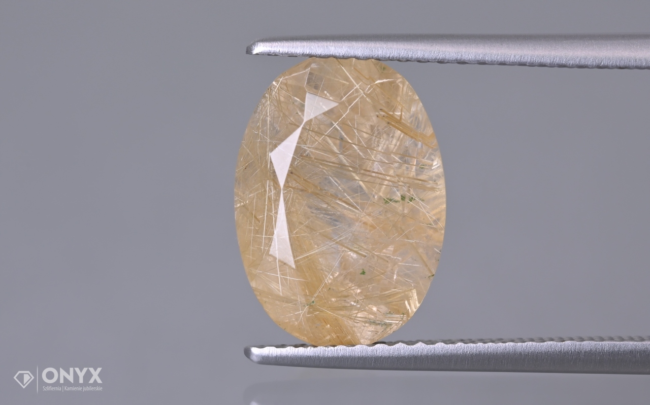 Křemen s rutilem fazetovaný ovál 13x9 mm