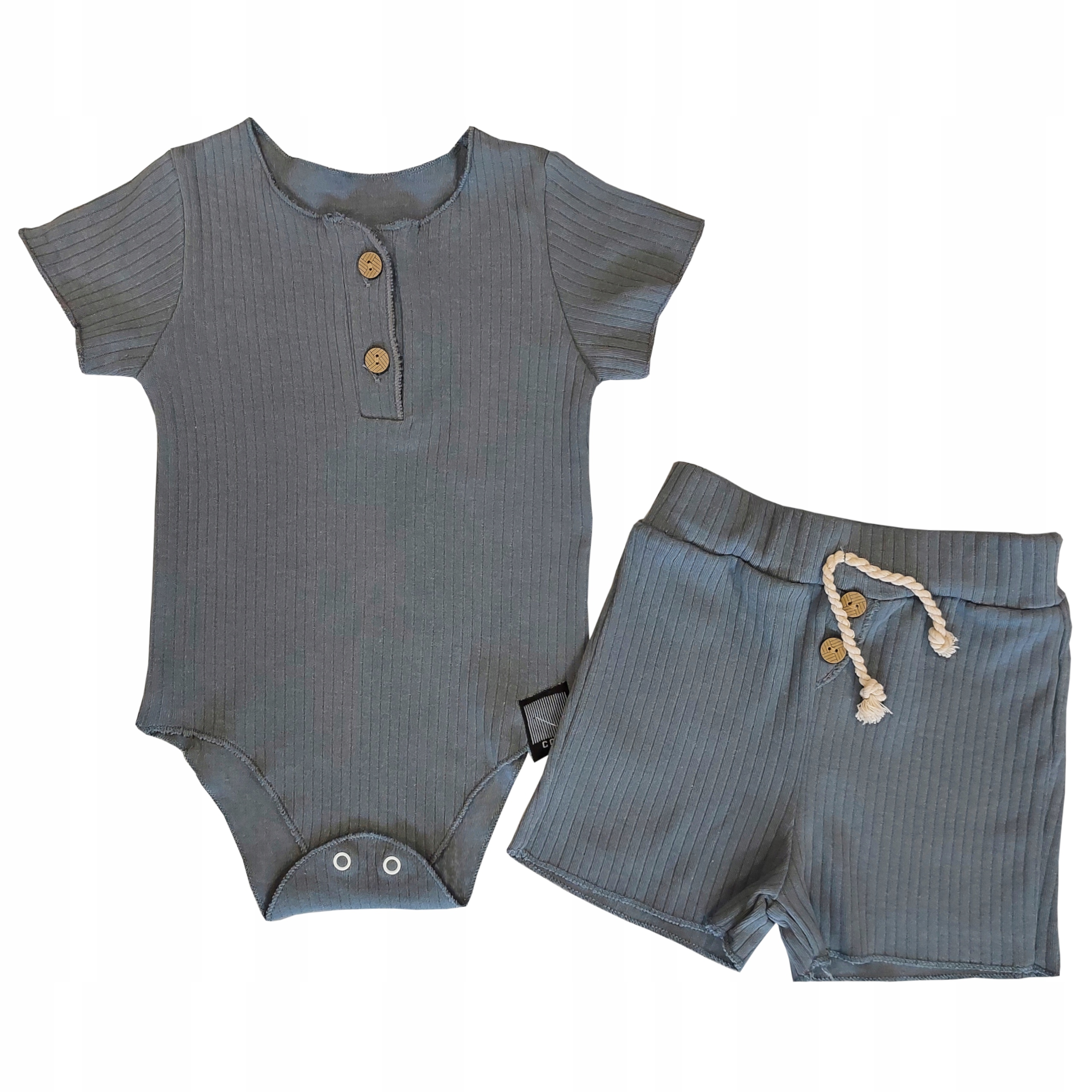 

Komplet 86 prążkowany body spodenki 12m