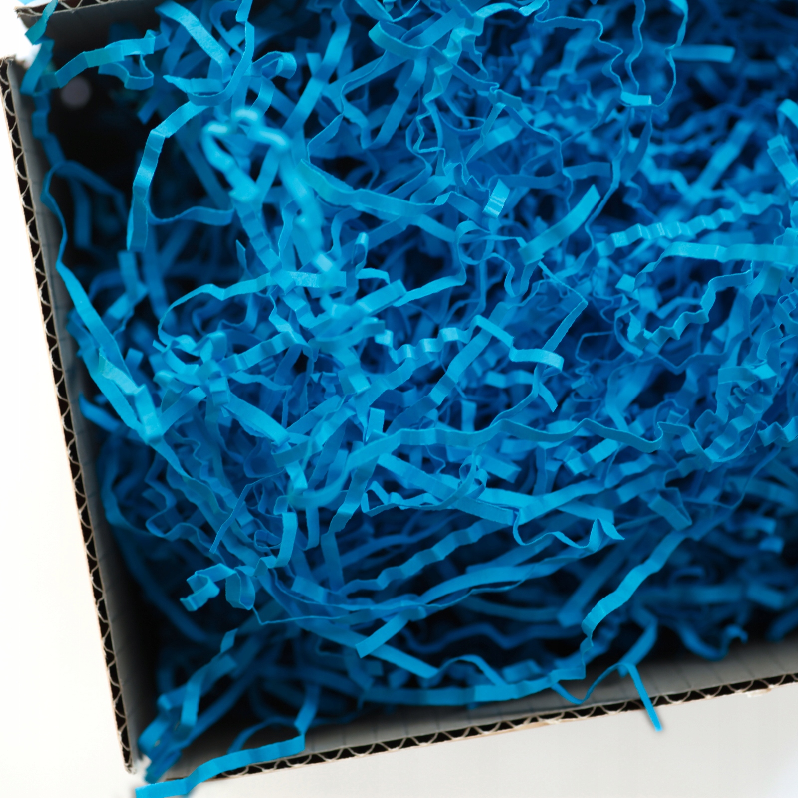 Papierowy niebieski wypełniacz do paczek, wiórki papierowe Sizzlepack 0,5kg Kod producenta 305