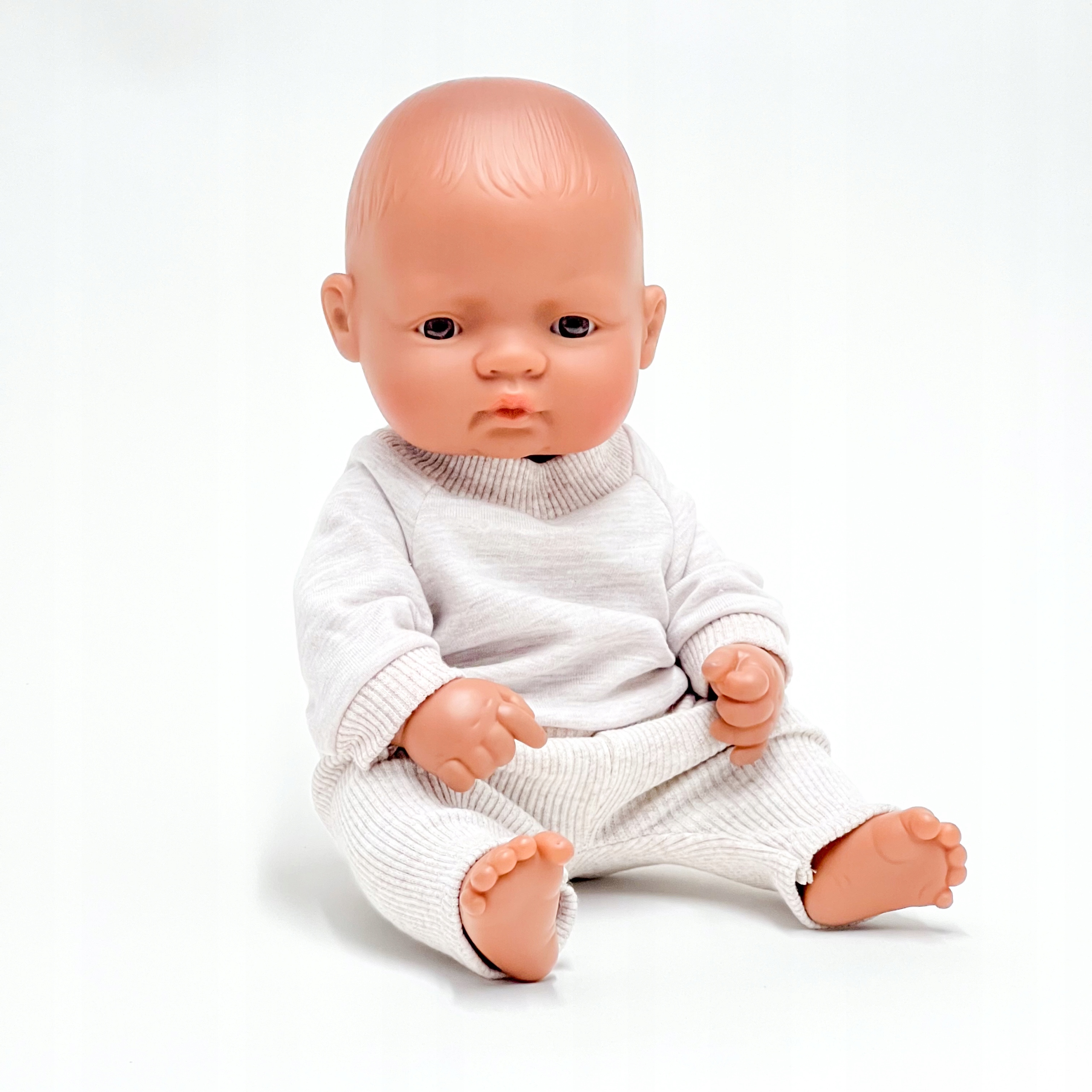 Dres dla lalki Miniland 32 cm, bluza i legginsy, beżowy