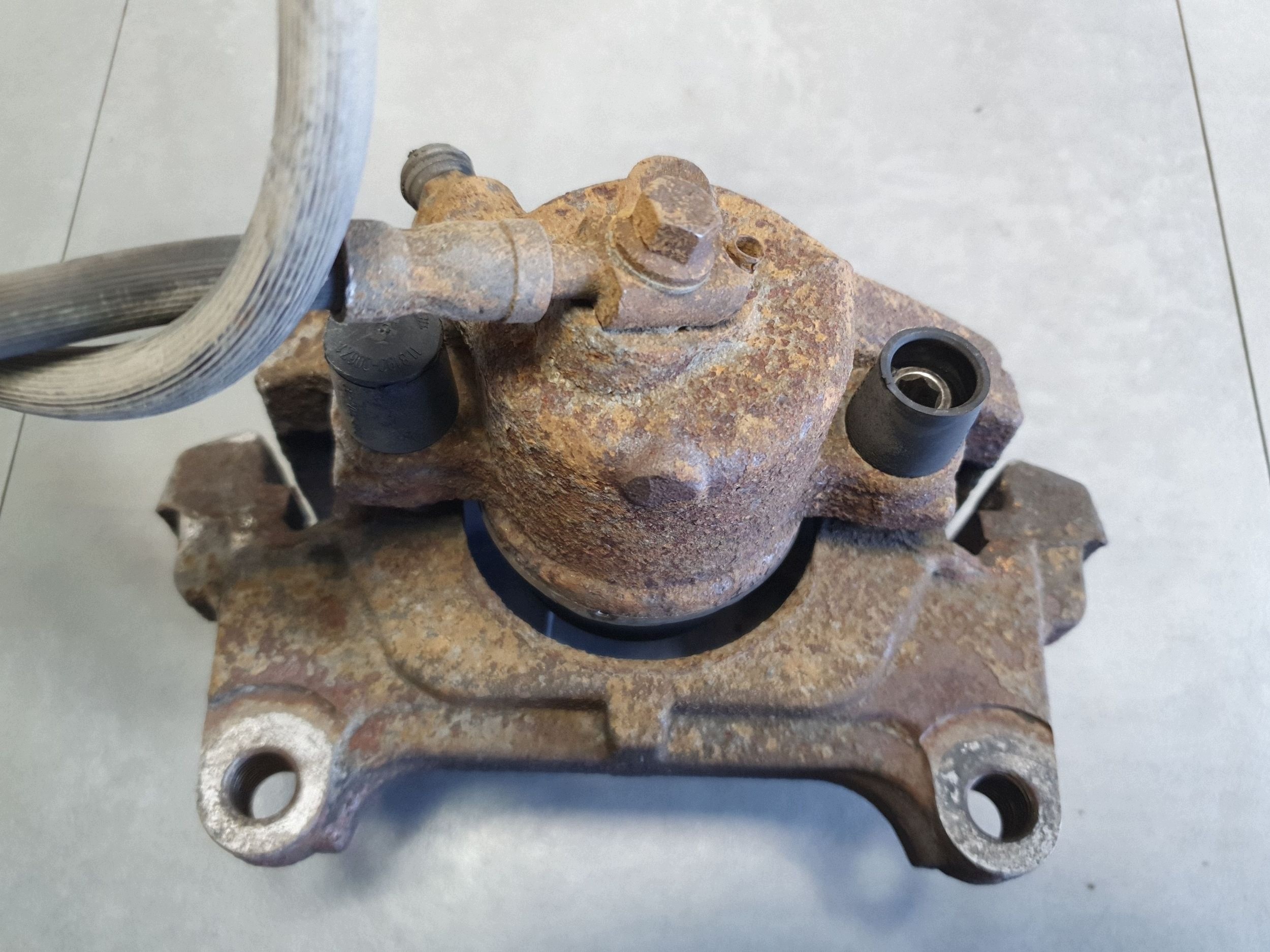 Volkswagen PASSAT CC caliper brake left front front jarzmo 1K0615123E