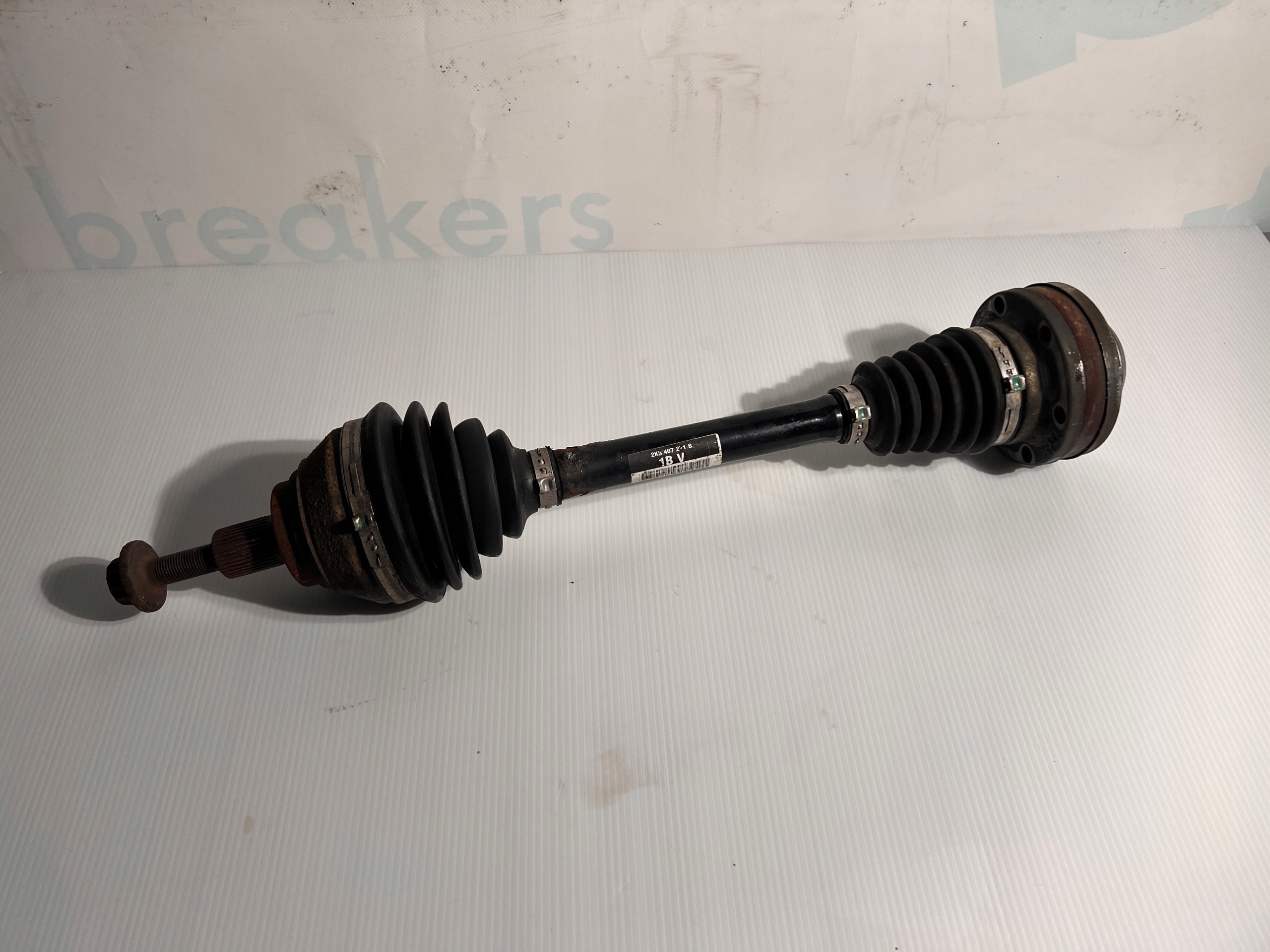 vw Caddy III полуось левый 2K3407271B