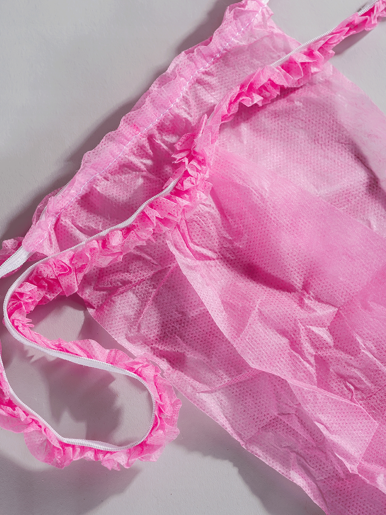 STRINGI JEDNORAZOWE DO ZABIEGÓW MAJTKI KOSMETYCZNE Z FALBANKĄ RÓŻOWE 50 SZT Stan opakowania oryginalne