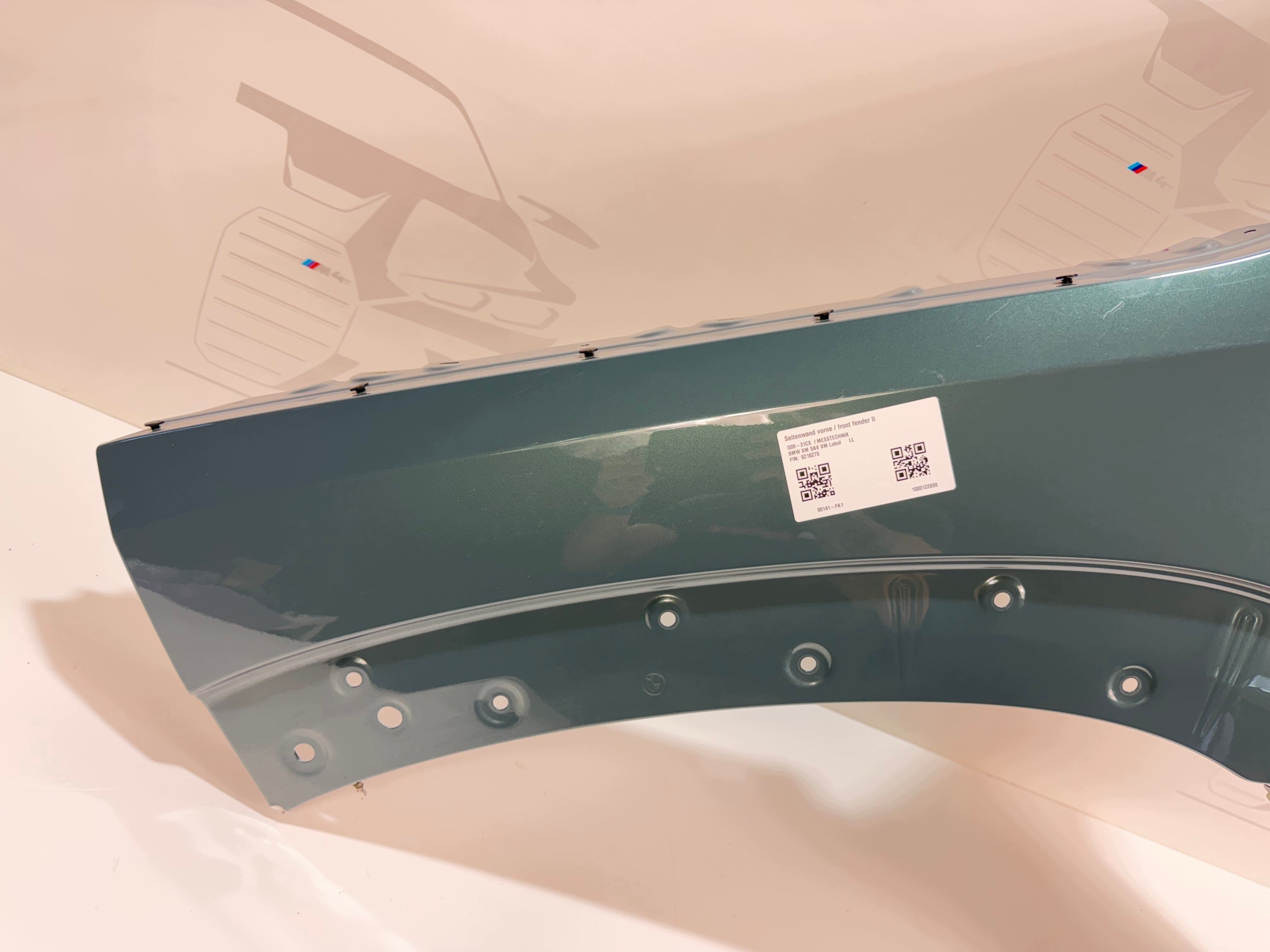 fender left front BMW XM G09 C5Y CAPE YORK GREEN METALLIC