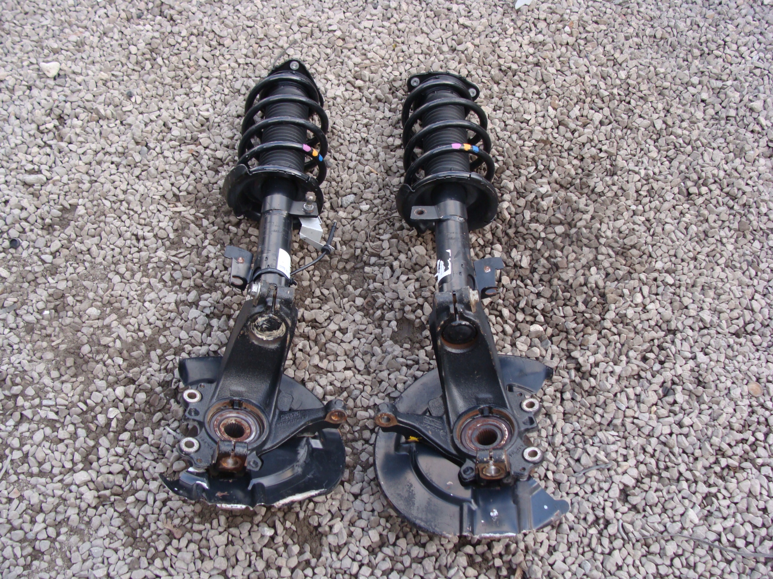 ZWROTNICA AMORTYZATOR PRAWY KUGA MK1 2012r Producent części Ford OE