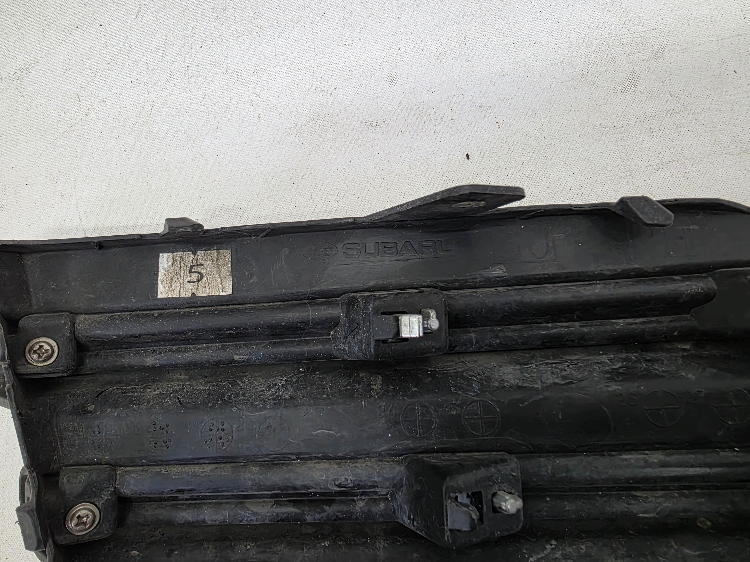 SUBARU FORESTER 5 V LIFT 22- grid of a bumper right front original