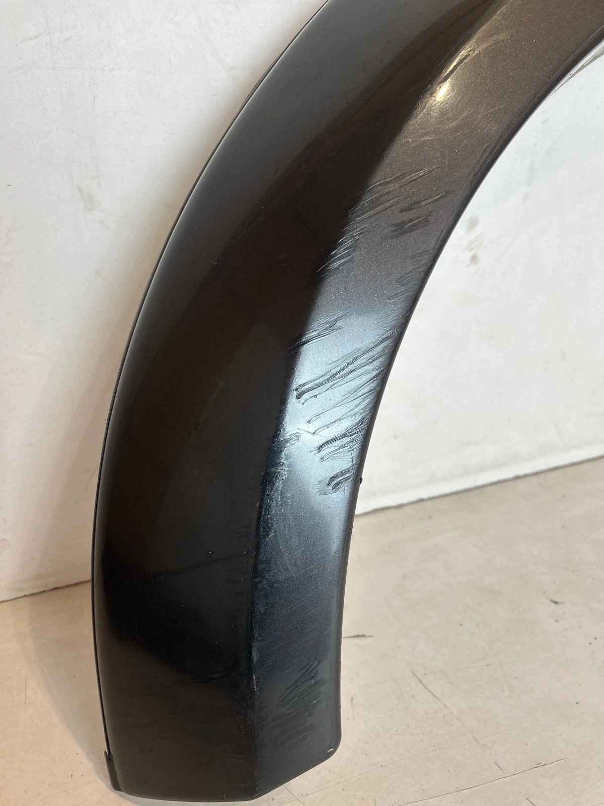 modanatura parafango anteriore sinistra Mitsubishi L200 06-14