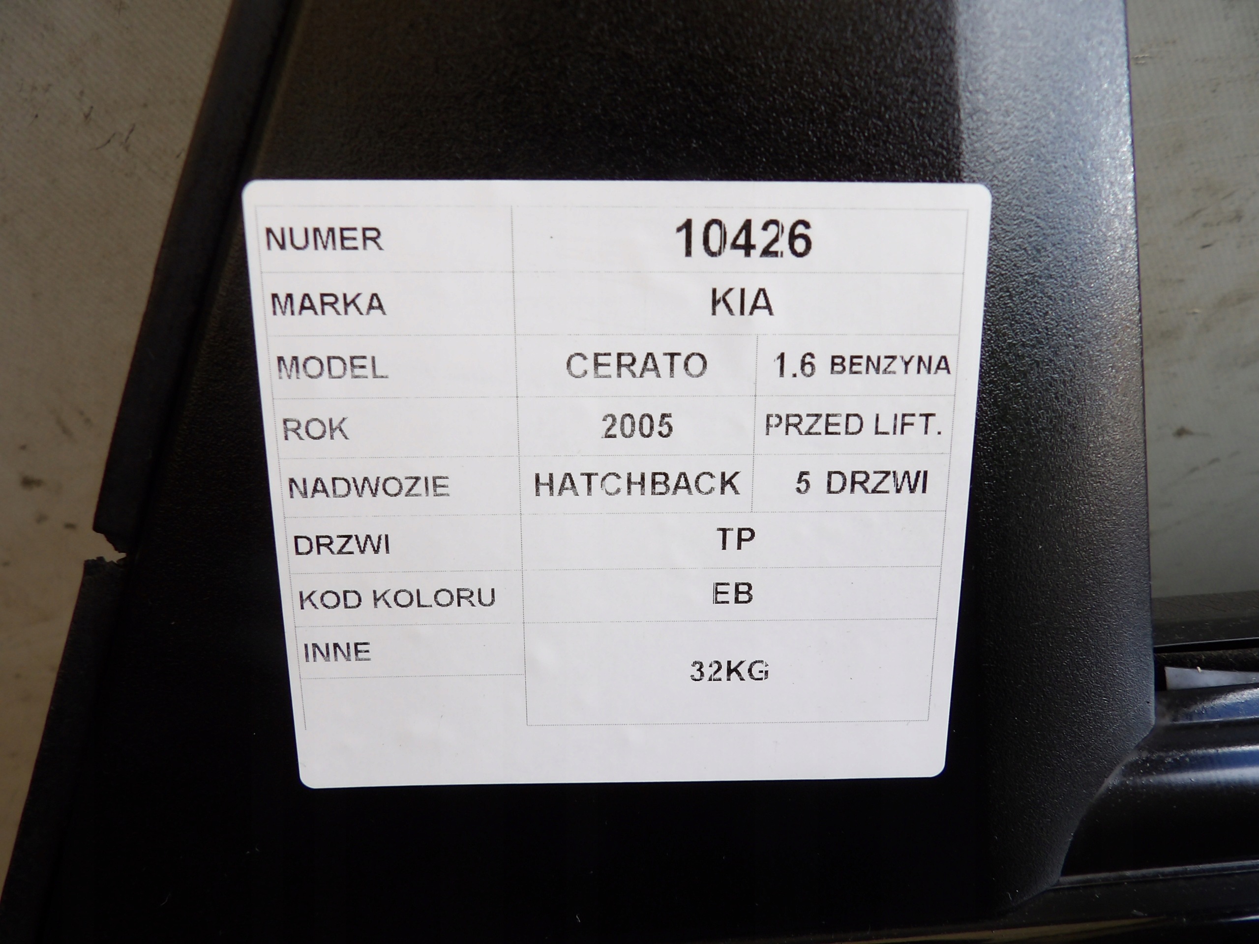 Kia Cerato and 1,6 door rear. right EB