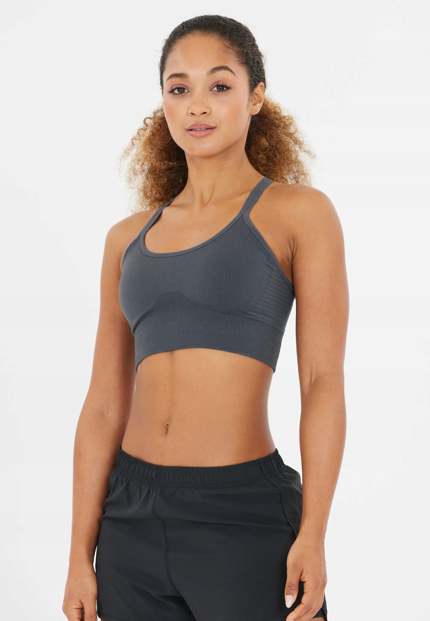 Podprsenka na jógu Athlecia Foan Seamless Bra šedá vel. S/m