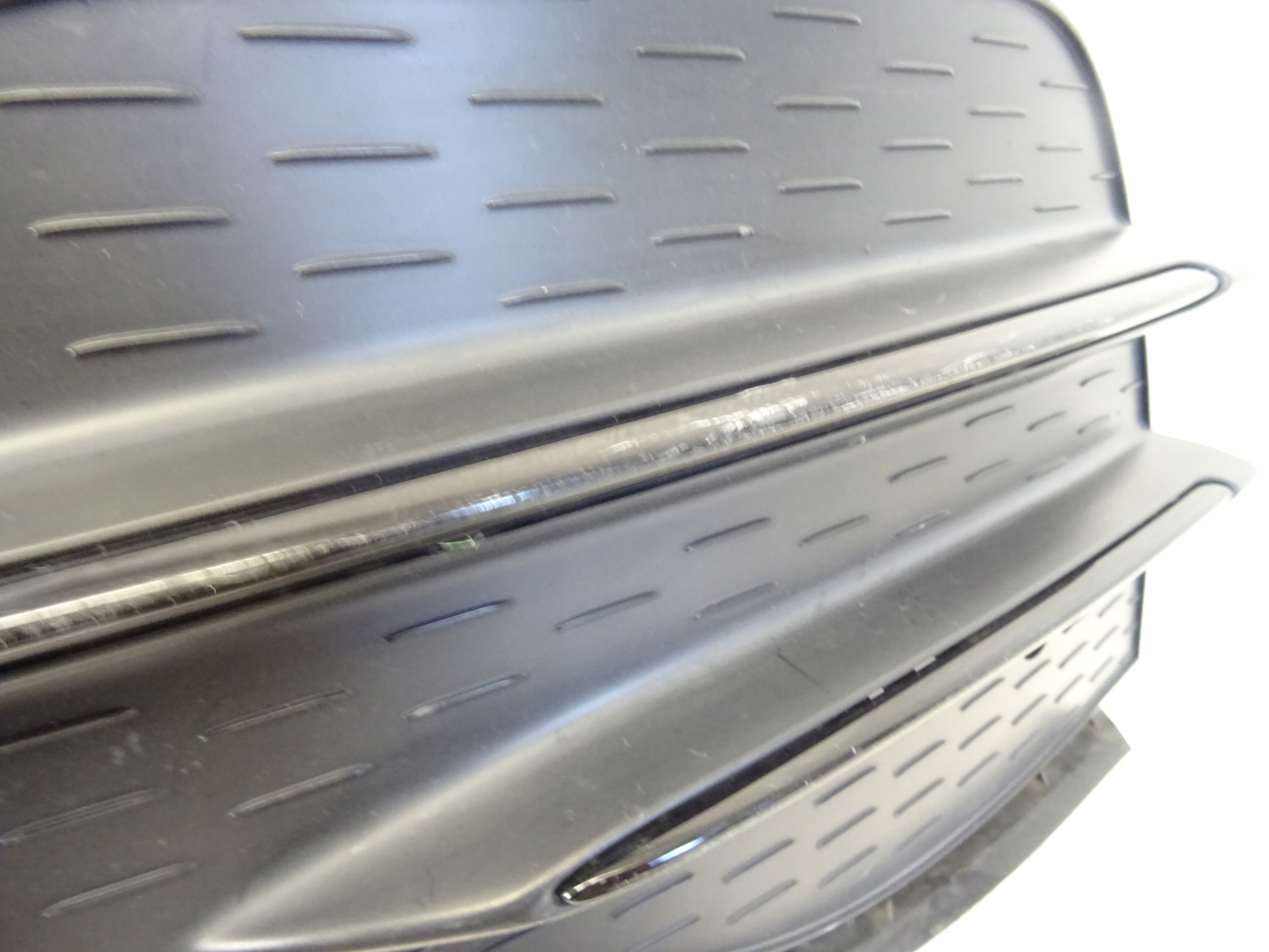 grid of a bumper front front left MERCEDES GLA W247 AMG A2478853805
