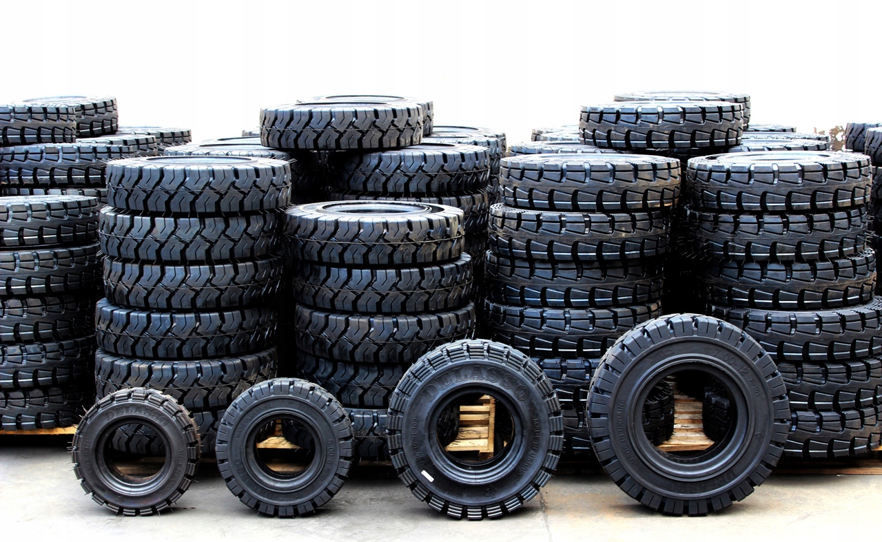 Шины для вилочных погрузчиков 28*9-15, полные QUI / STN