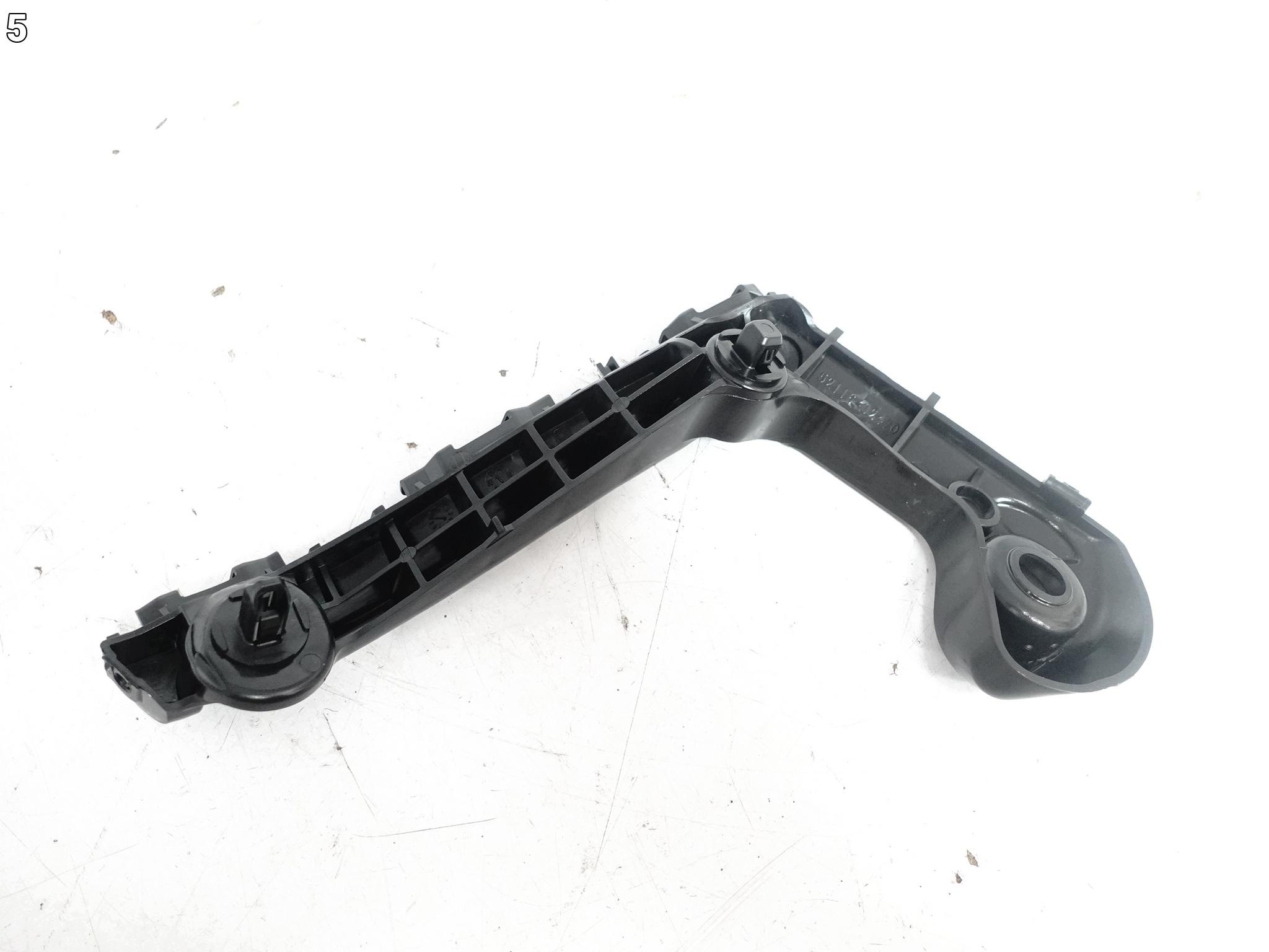 TOYOTA COROLLA E21 XII 18- support holder W bumper front left ORG