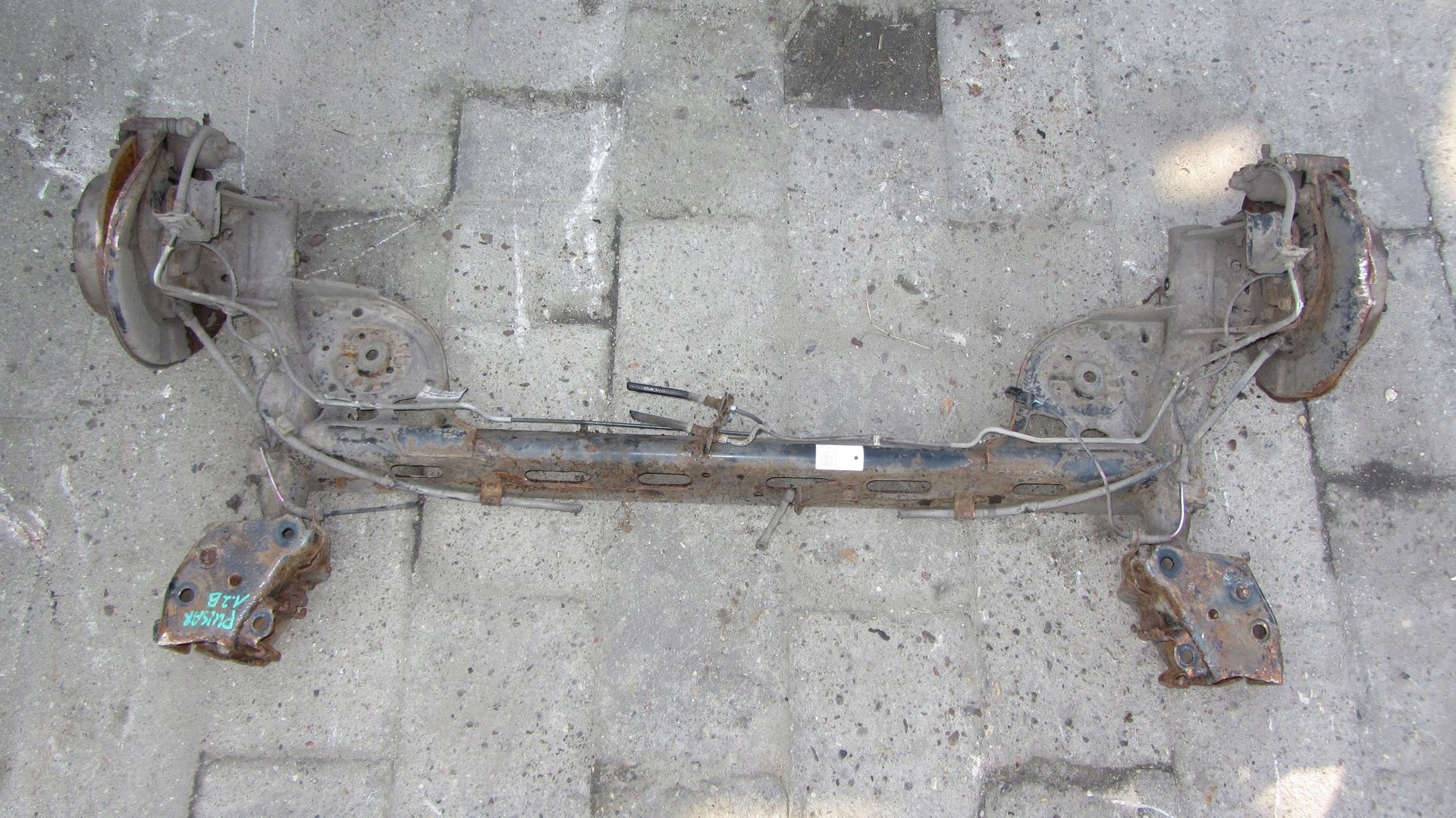 NISSAN PULSAR BELKA ZAWIESZENIA OŚ TYŁ 13-17