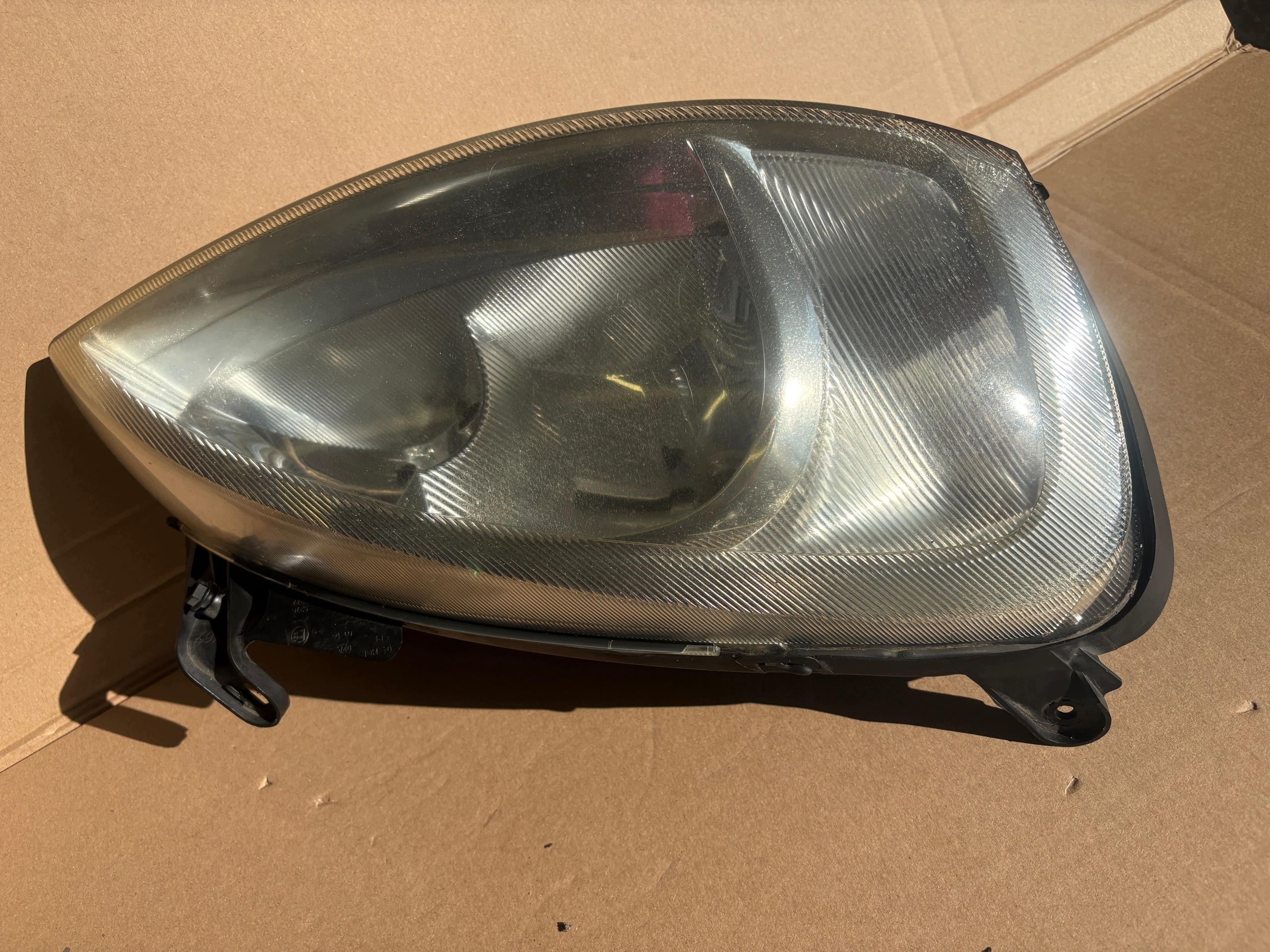 OPEL CORSA C feu droite avant 09114330
