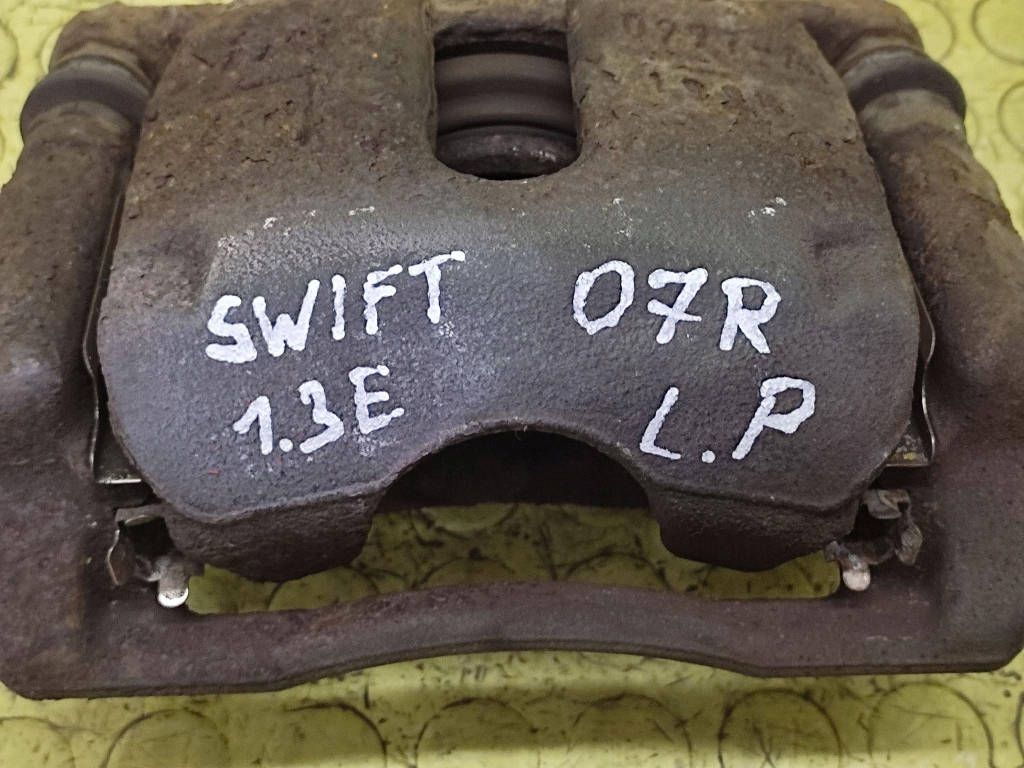 SUZUKI SWIFT IV 1.3 caliper left front