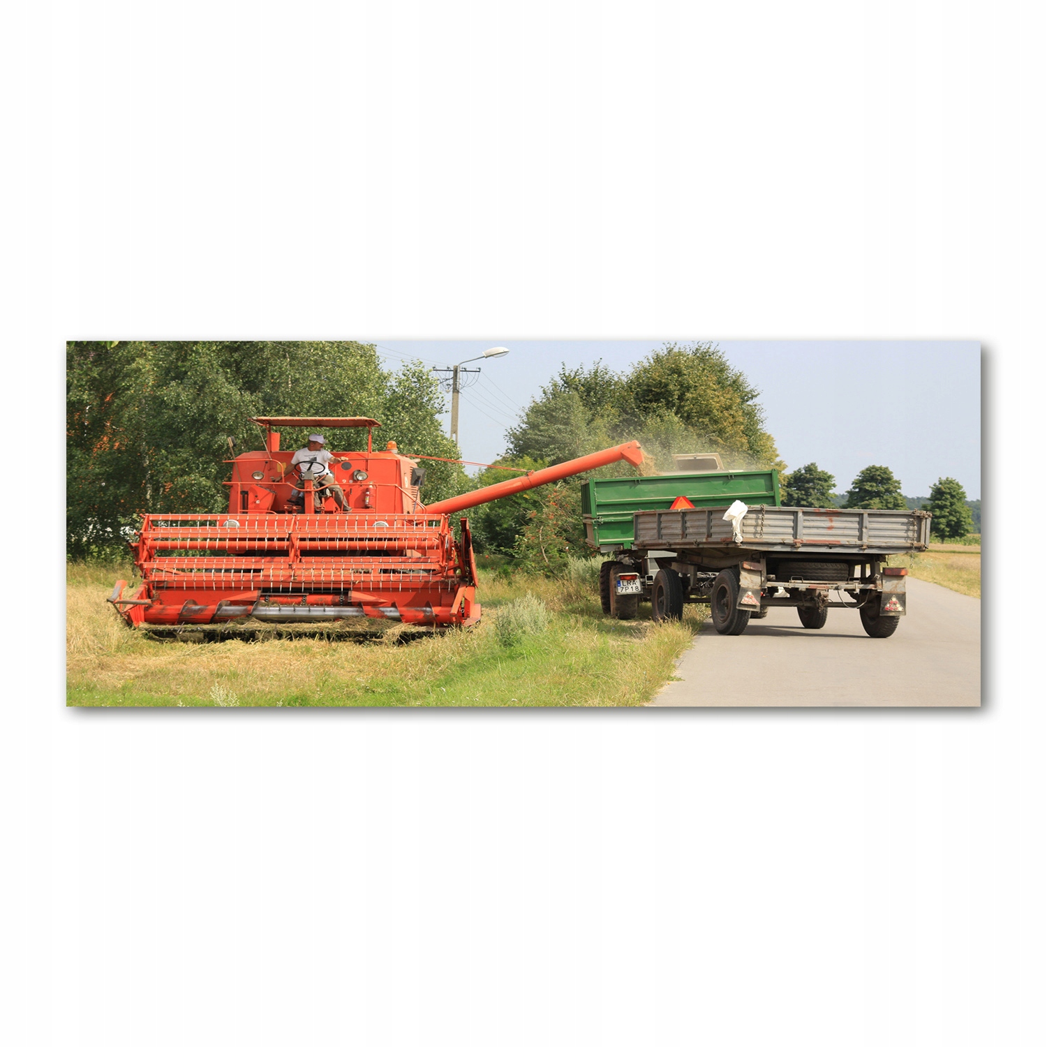 

Foto obraz na szkle akrylowym Kombajn 125x50 cm