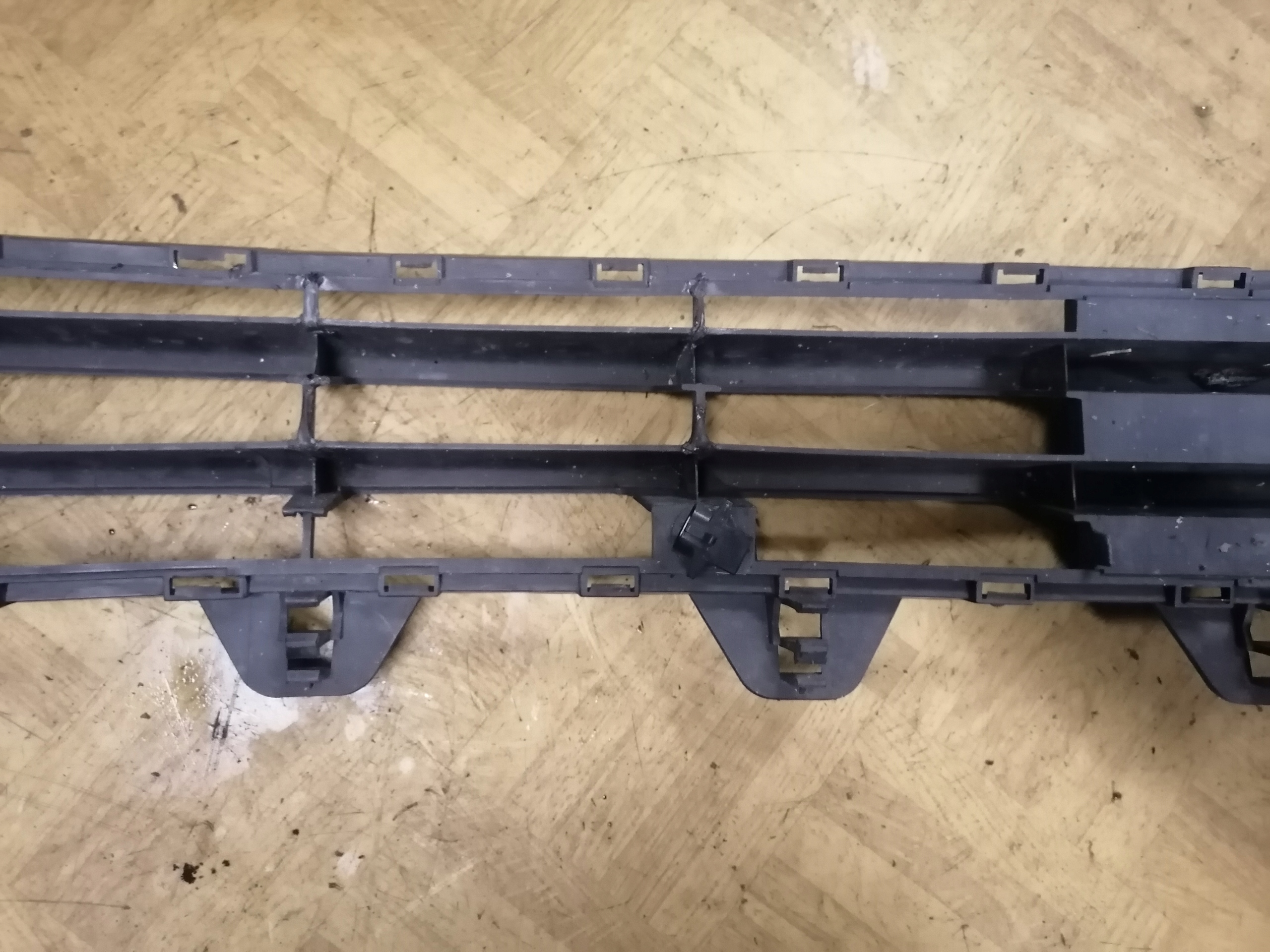 OPEL MERIVA A Lüftungsgitter mitte der Stoßstange 13184267