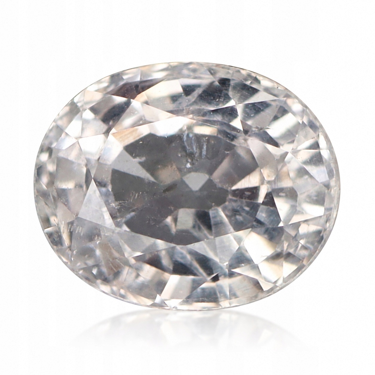Přírodní safír 0.76 ct Bílý Ovál Cejlon SI1 certifikát Wbd
