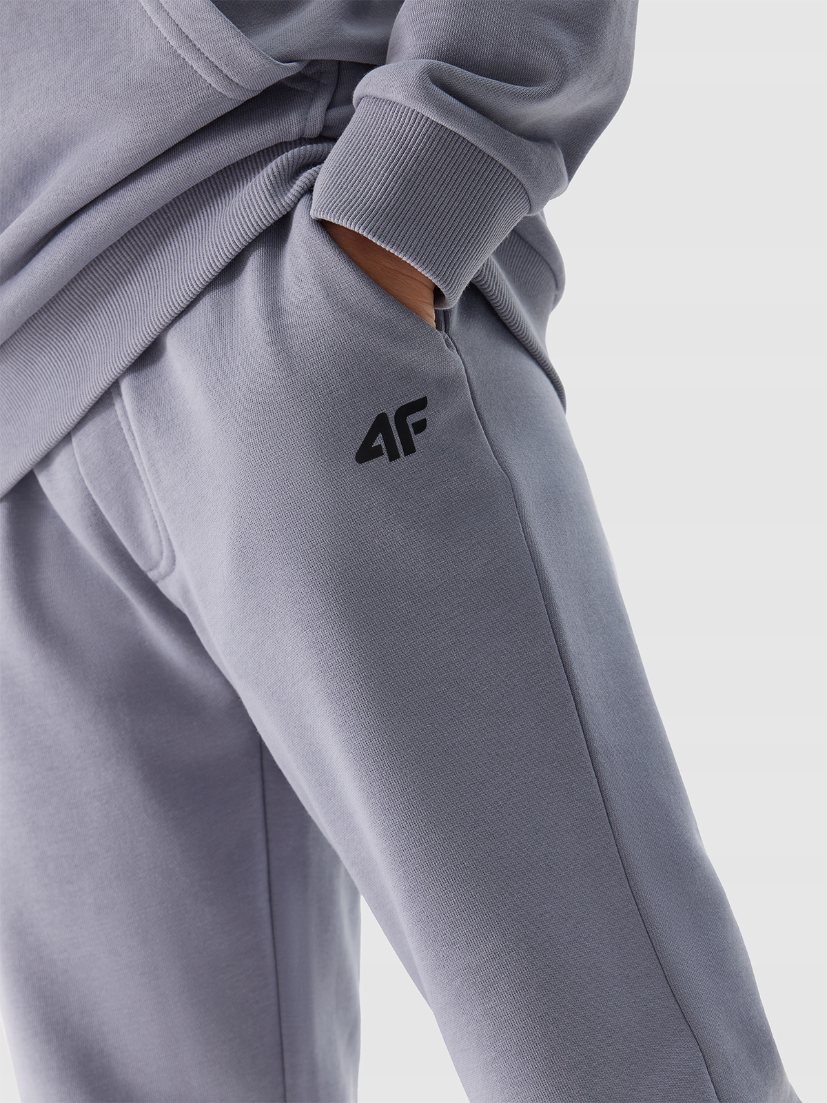 SPODNIE 4F CHŁOPIĘCE DRESOWE JOGGERY - JASNO NIEBIESKIE r. 158 Wiek dziecka 12 lat +