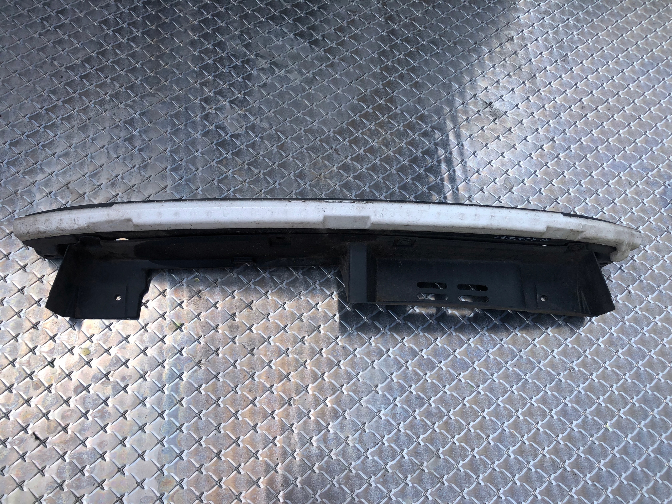 sider pillar of a bumper front SUBARU LEGACY IV