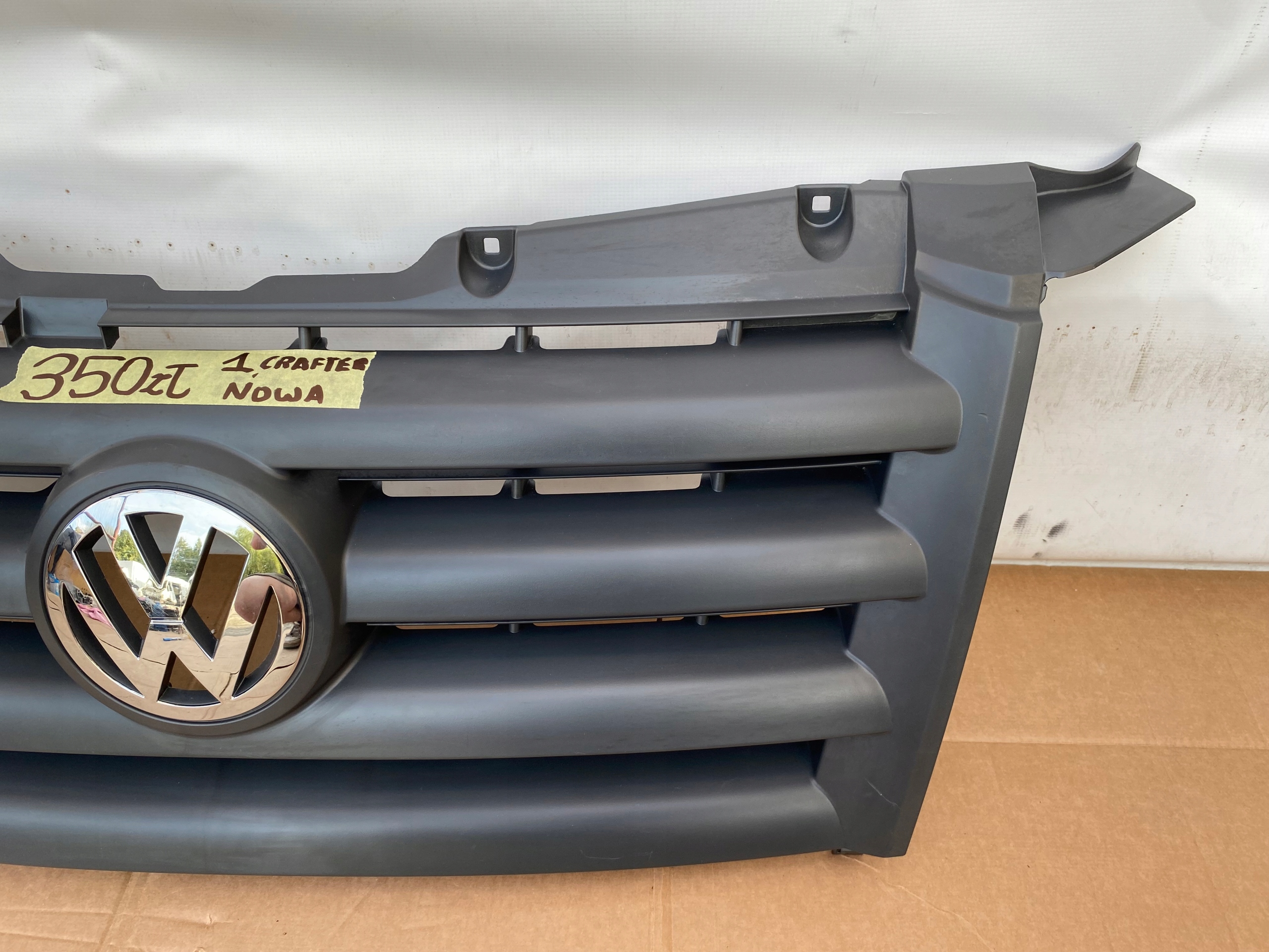VW CRAFTER 06- maska nová original šedá 2E0853653