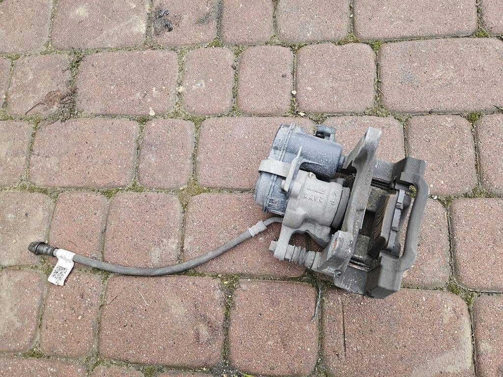 caliper rear part rear left zaciskowy jazmo 4x4 Opel Insignia B