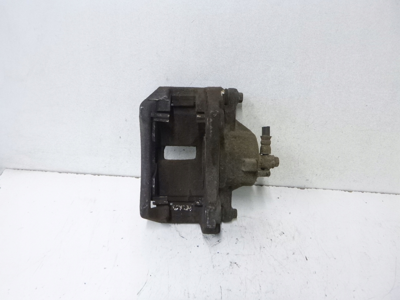 caliper brake front left Nissan Primera P12 1.8 02-07r.