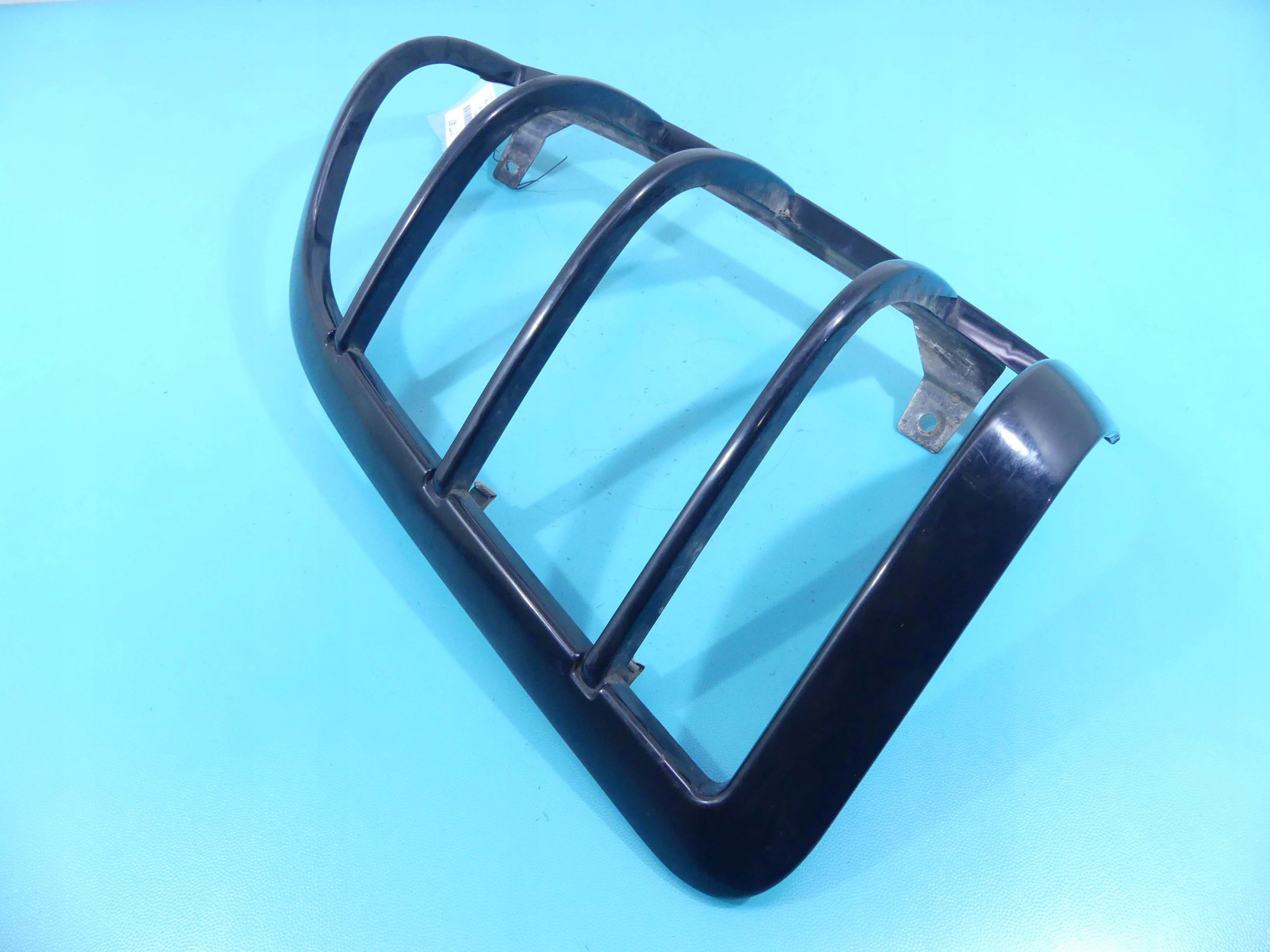 6M3J-13K432-AAW - КРИШКА РЕШІТКА ЛАМПИ ЛІВИЙ ЗАДНІЙ RANGER IV 06-11