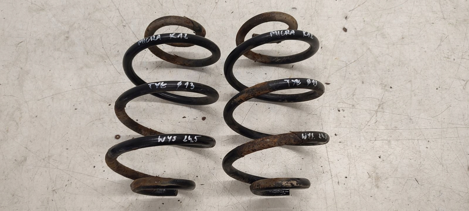 spring rear part rear Nissan Micra K12 1,2 12V 3D
