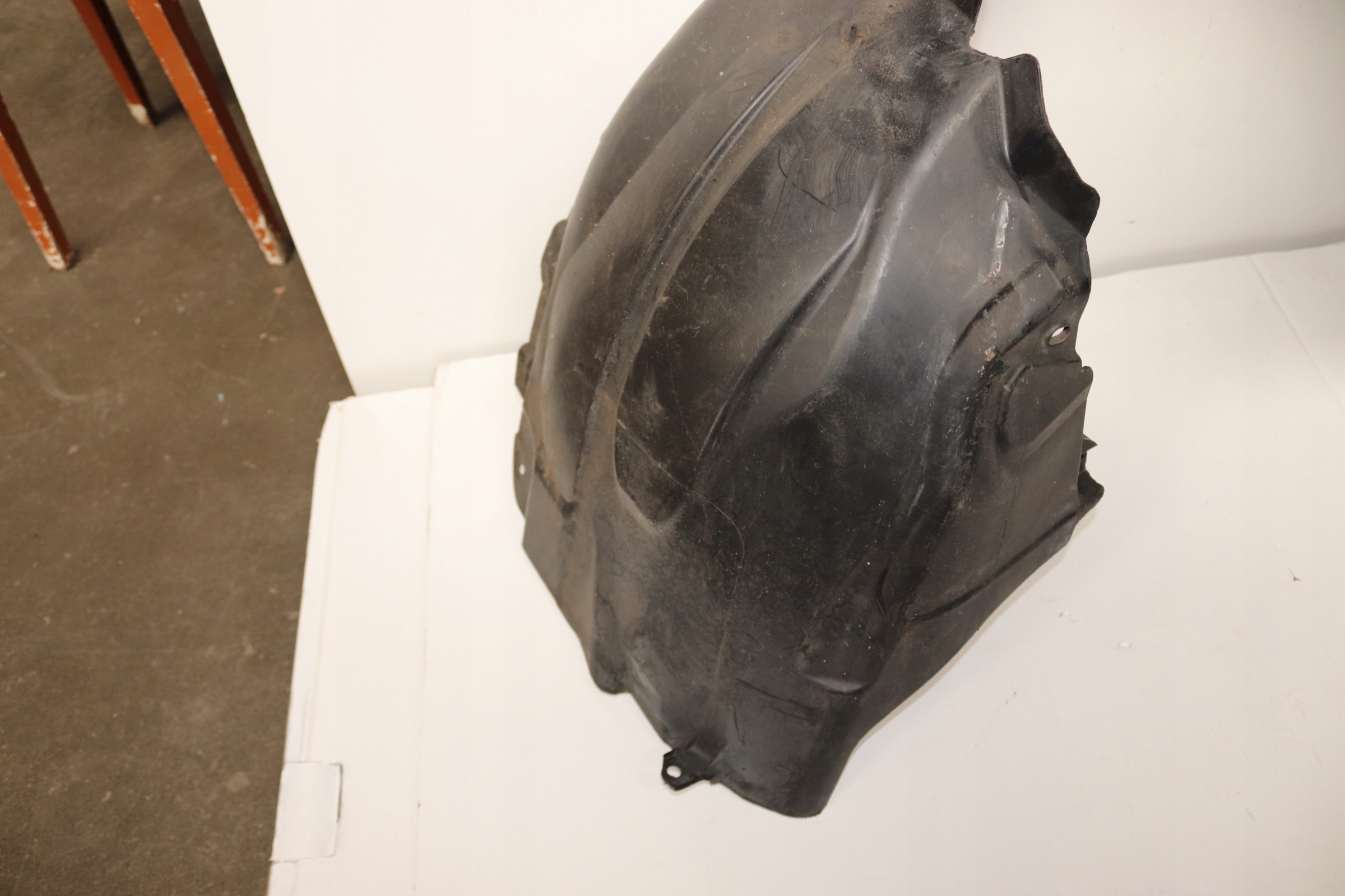 OPEL ADAM mudguard front left UZYWANE ORYGINALNE GM 39005657