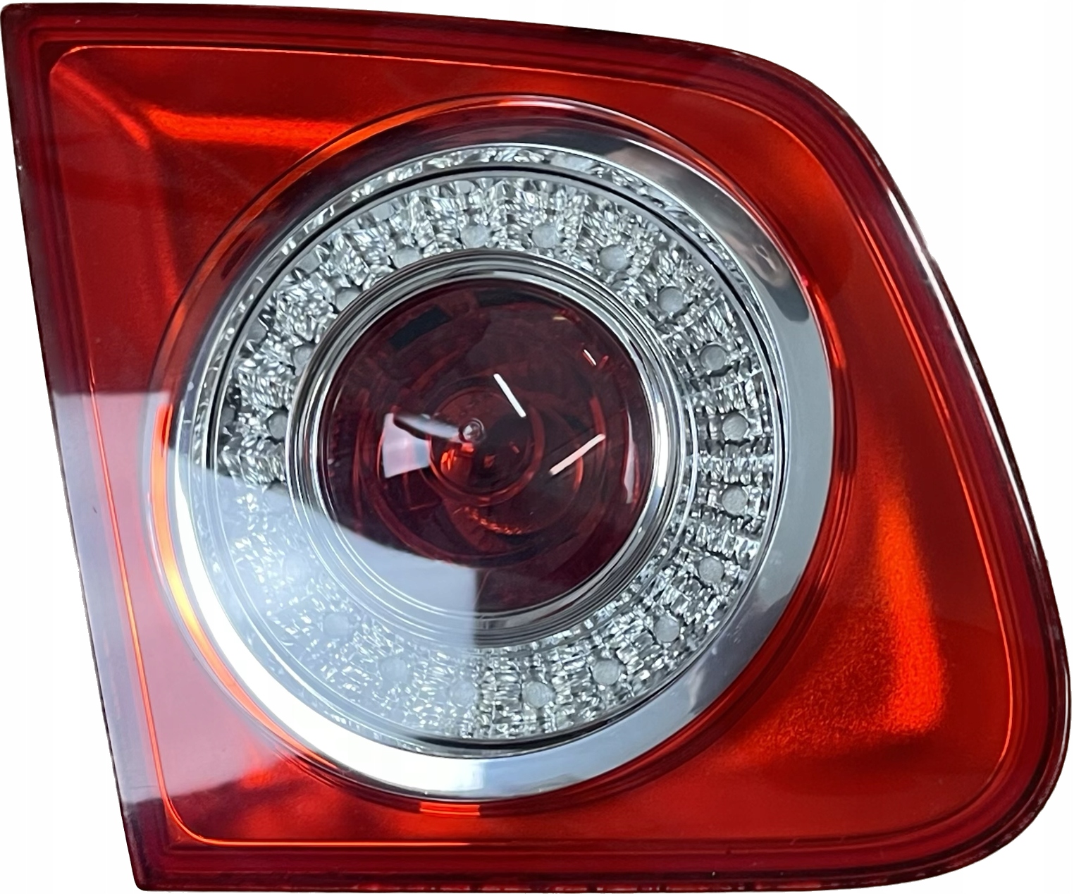 фонарь левый в крышке багажника vw III 03-08