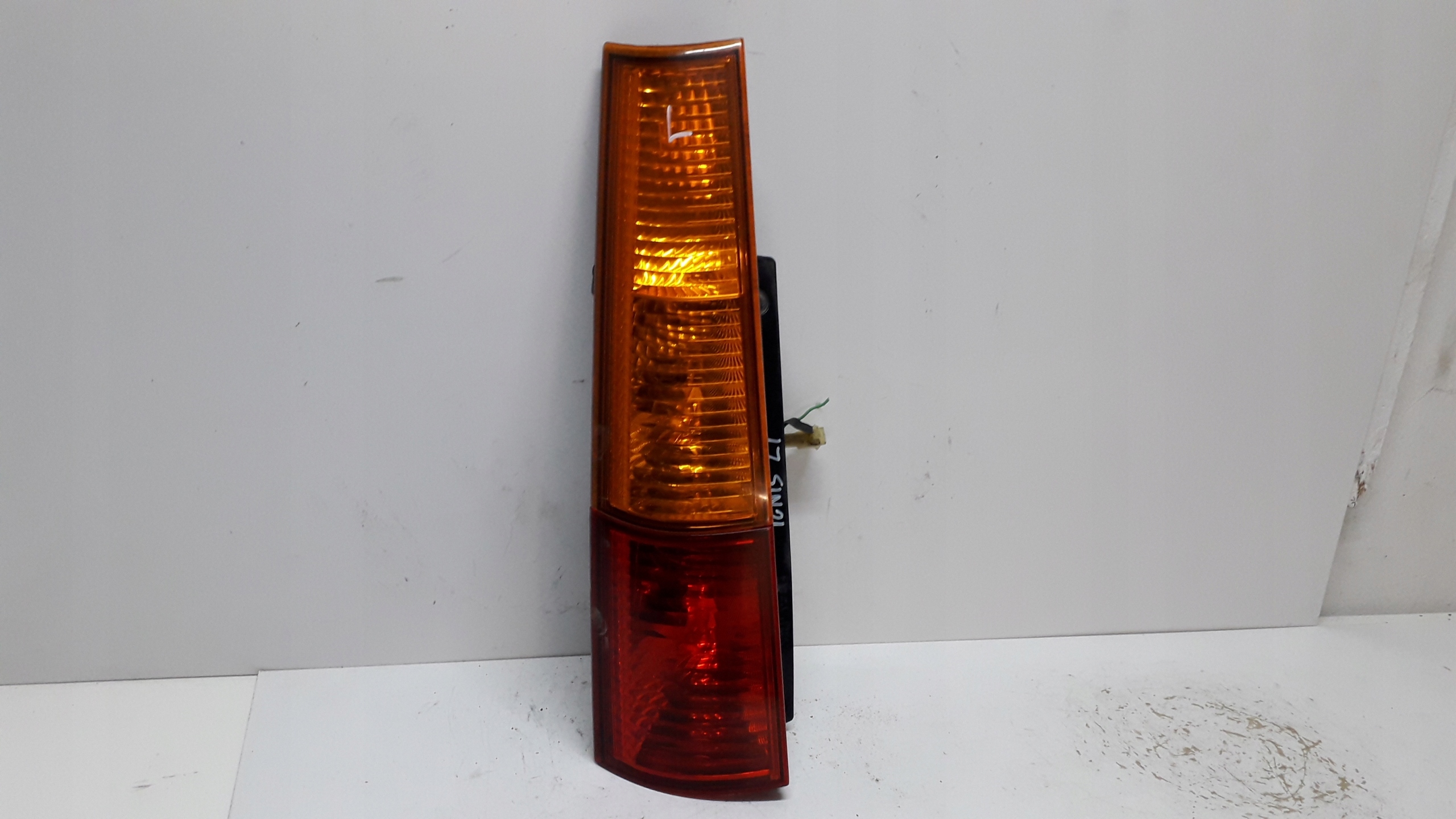 SUZUKI IGNIS 2 SUBARU JUSTY 03- LAMPA LEWA TYLNA