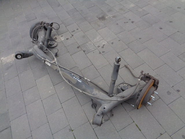 ZAWIESZENIE TYLNE BELKA OŚ KIA RIO III HATCHBACK LIFT 2015 ROK TARCZE