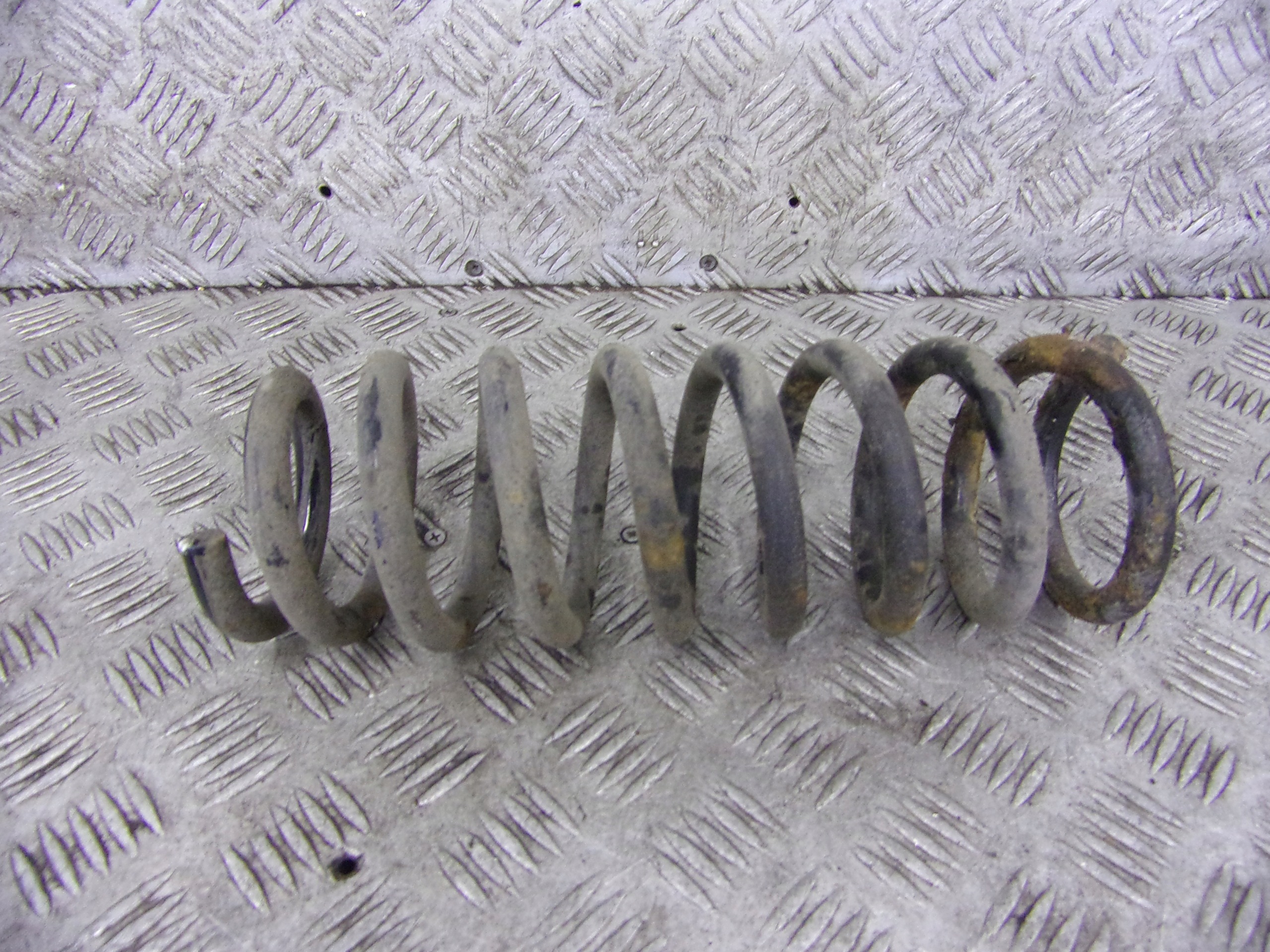 spring rear part rear KIA CARENS III