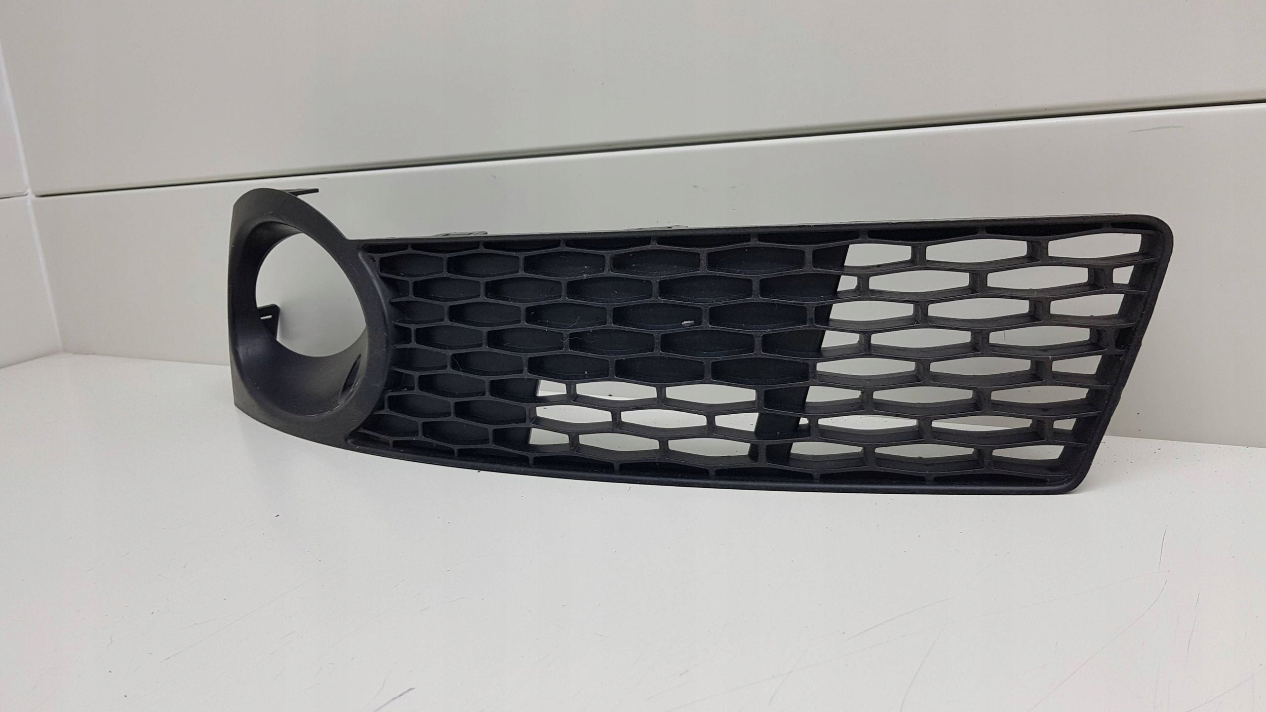 SAAB 95 9-5 2005 - grid left bumper front 12756078