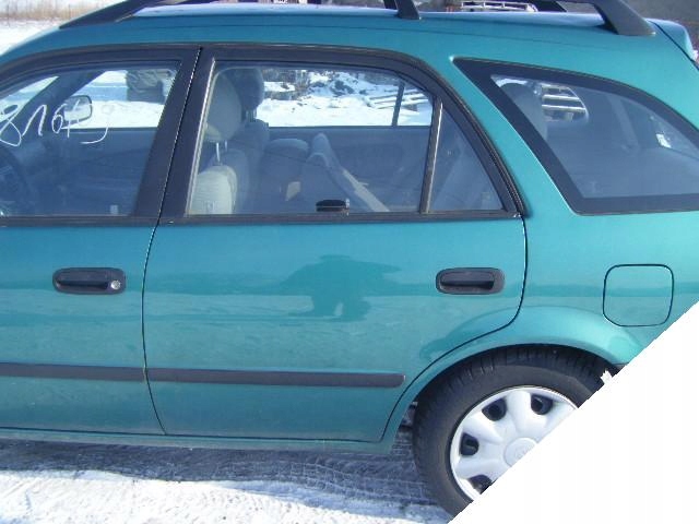 TOYOTA COROLLA E11 ZAMEK LEWY TYLNY