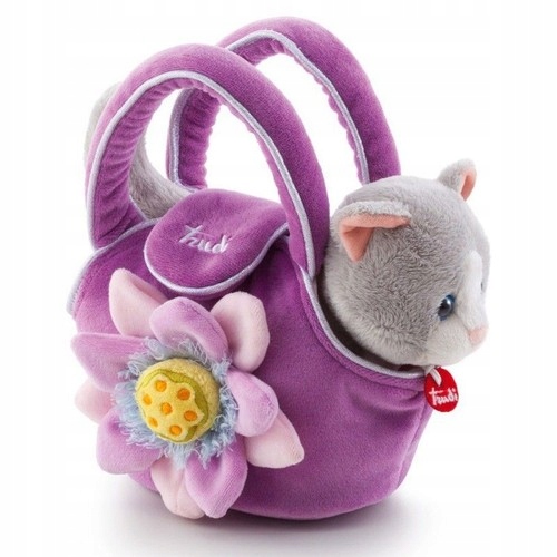 

Trudi Kotek w fioletowej torebce