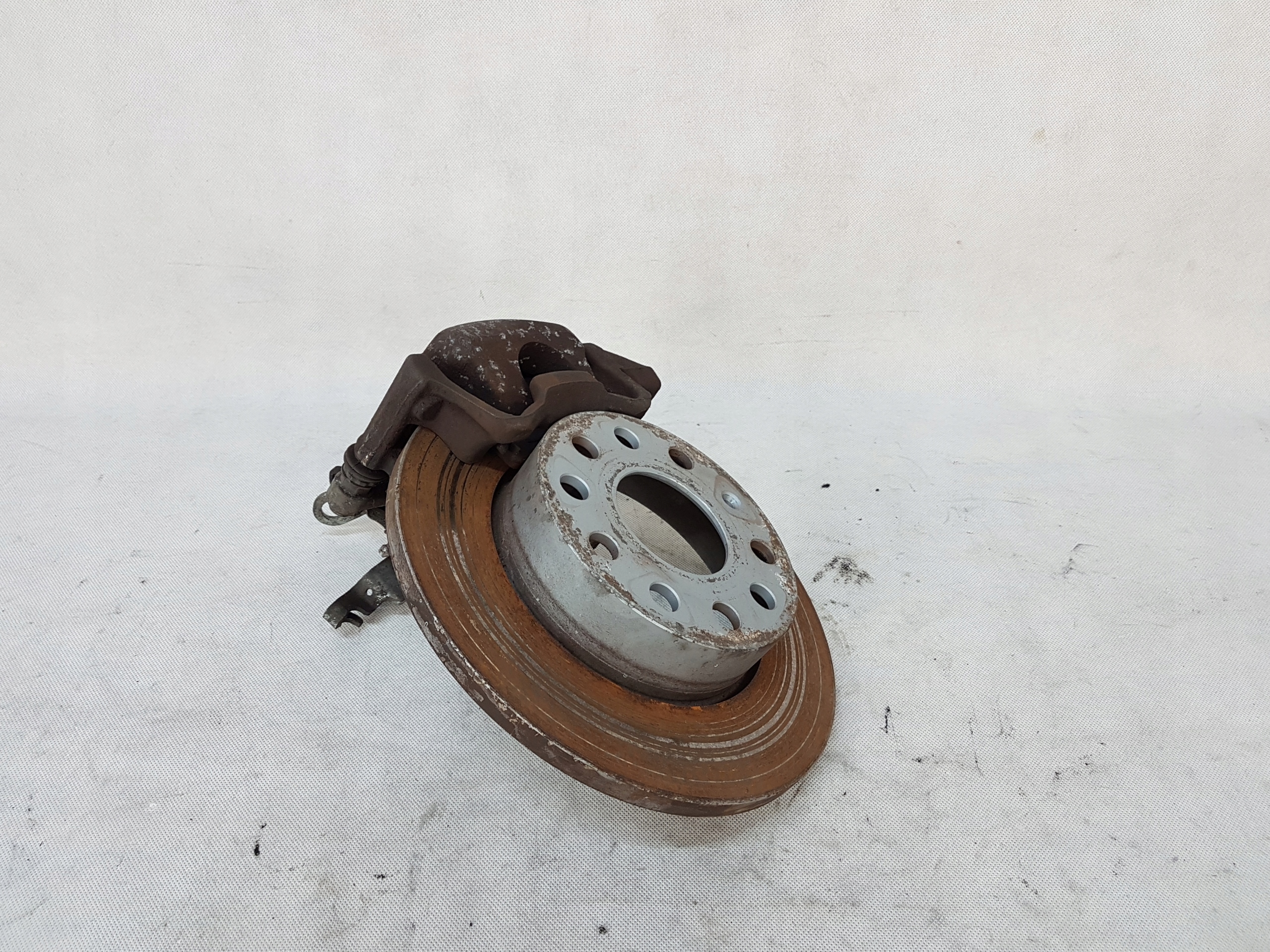 ZACISK HAMULCOWY LEWY PRAWY TYŁ TYLNY VW TOURAN I