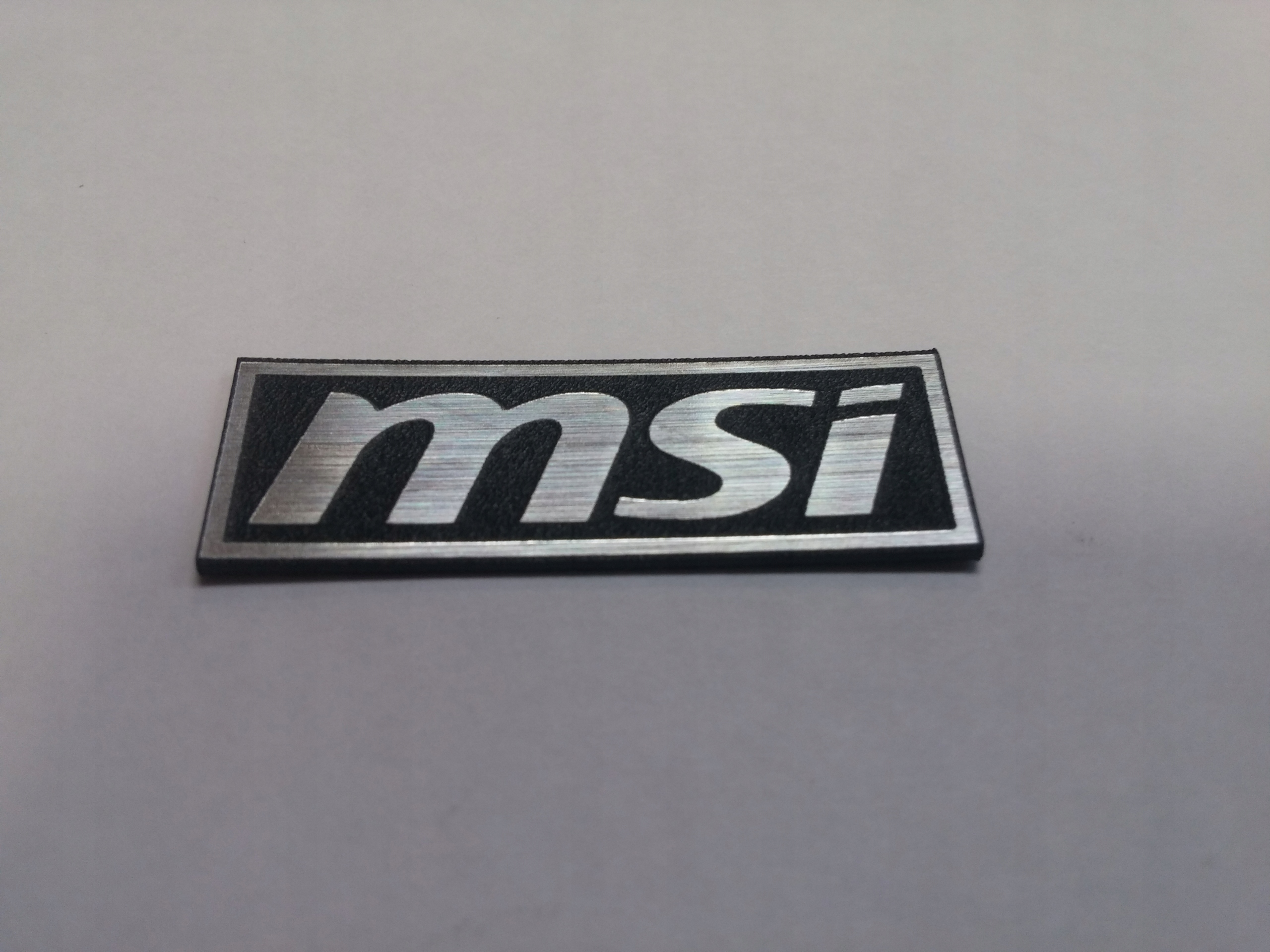 

Msi naklejka emblemat 38 x 13 mm * Srebrna