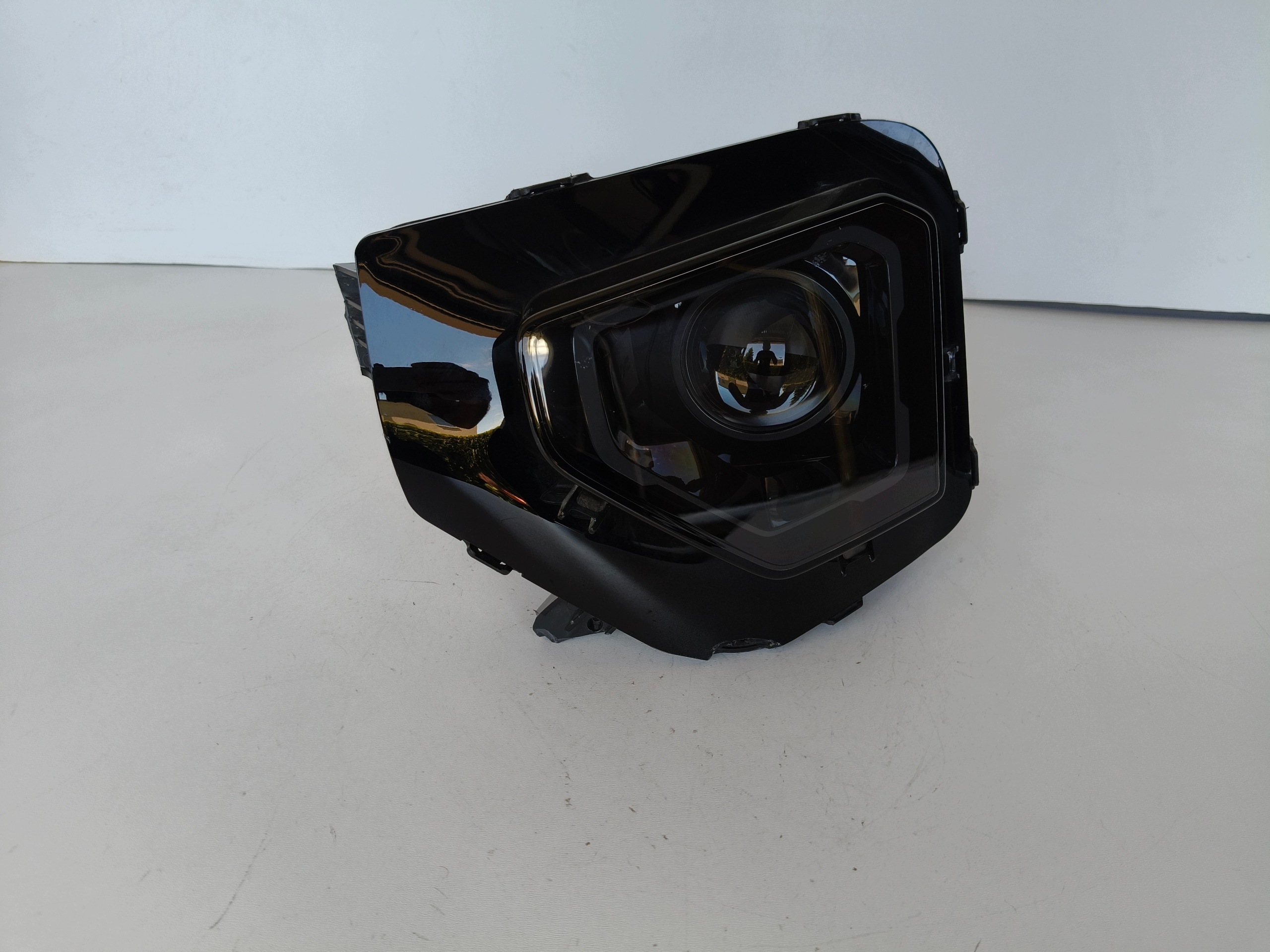 light left REFLEKTOR DACIA SPRING 23- LIFT LED