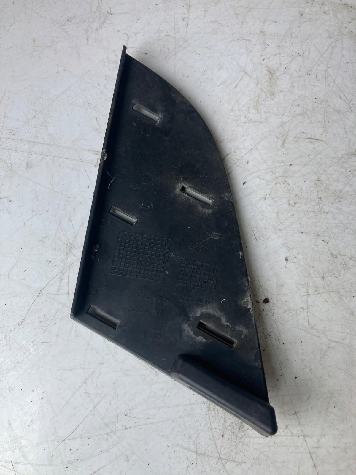 spoiler of a bumper left front RENAULT SCENIC III 623110001R
