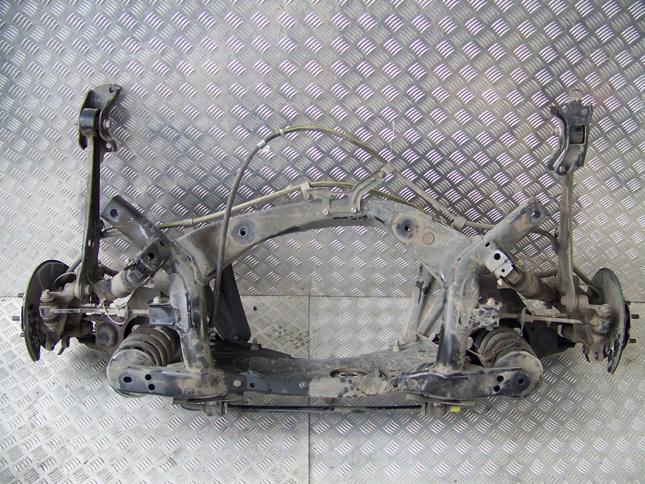 TOYOTA RAV 4 IV 16 19 ZAWIESZENIE TYŁ BELKA SANKI 2.5 HYBRYDA