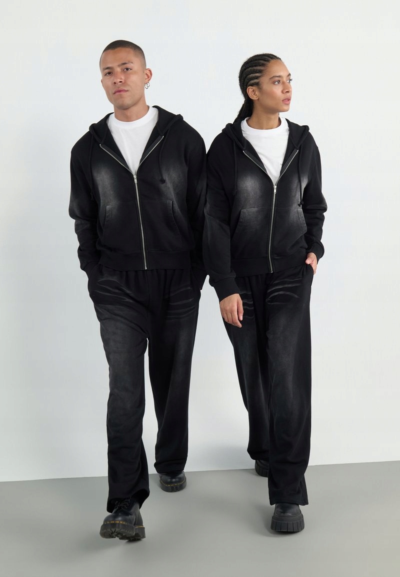 Unisexové tepláky Yourturn L v černé barvě