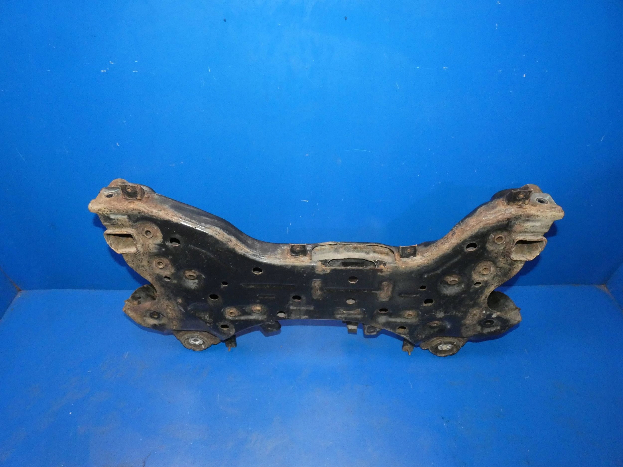 KIA SPORTAGE IV axle beam of the engine subframe sider below engine front