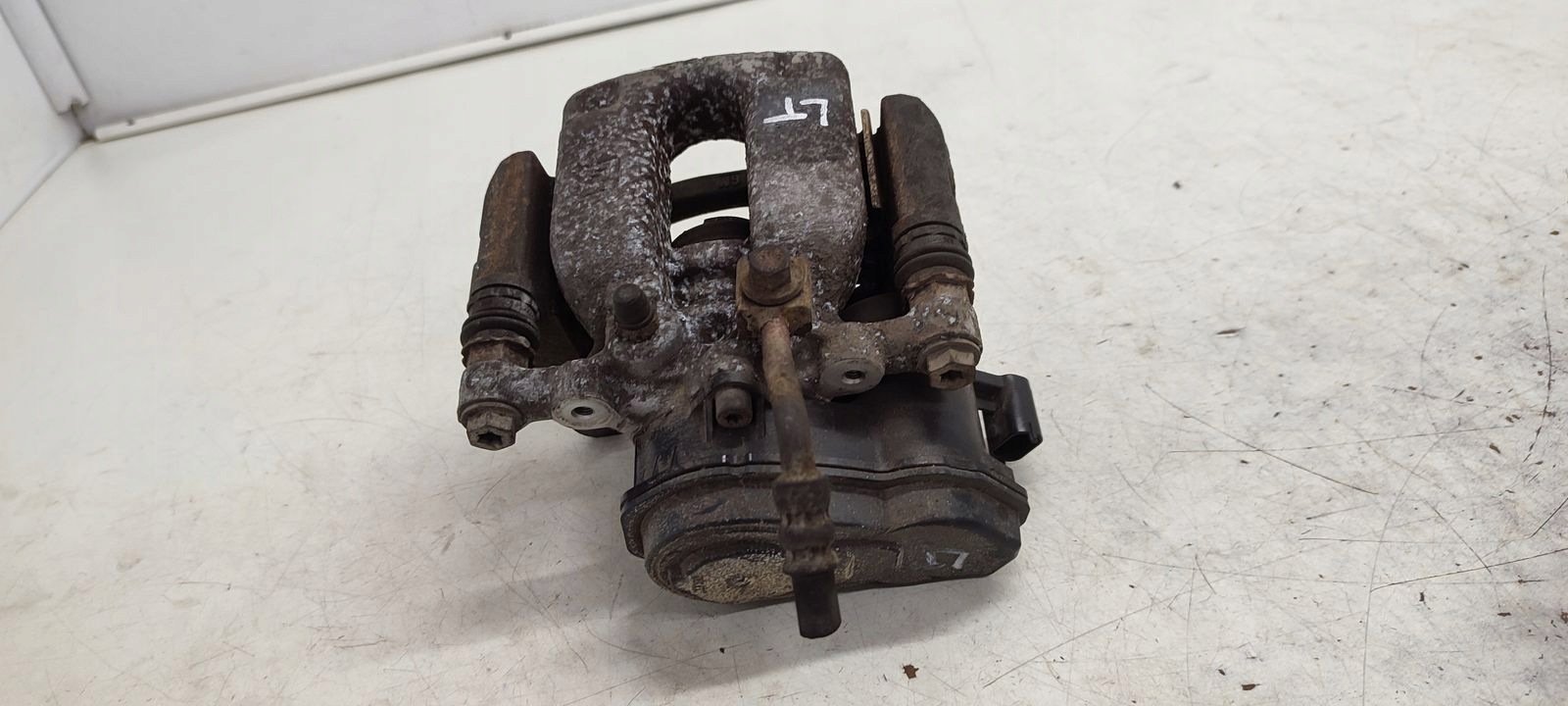 caliper rear part rear left Opel Astra K LIFT 1,5 CDTI