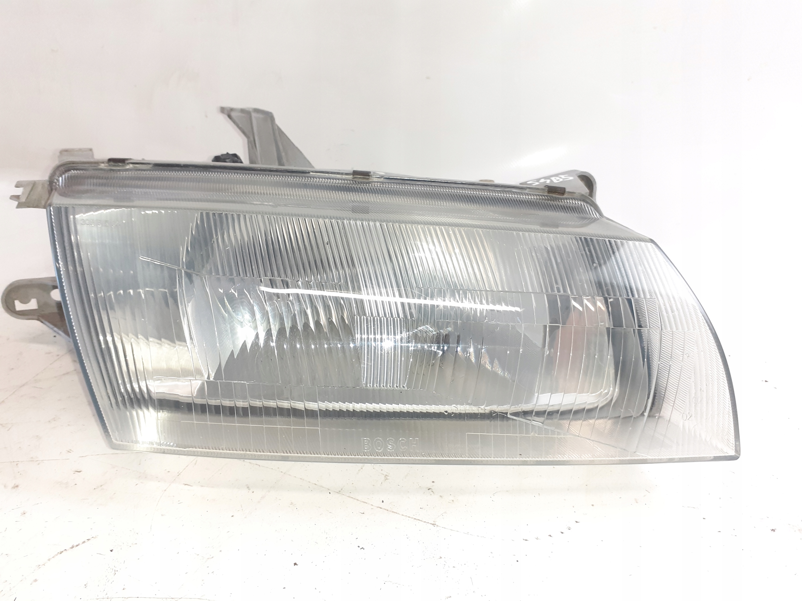 light right front Mazda 323F