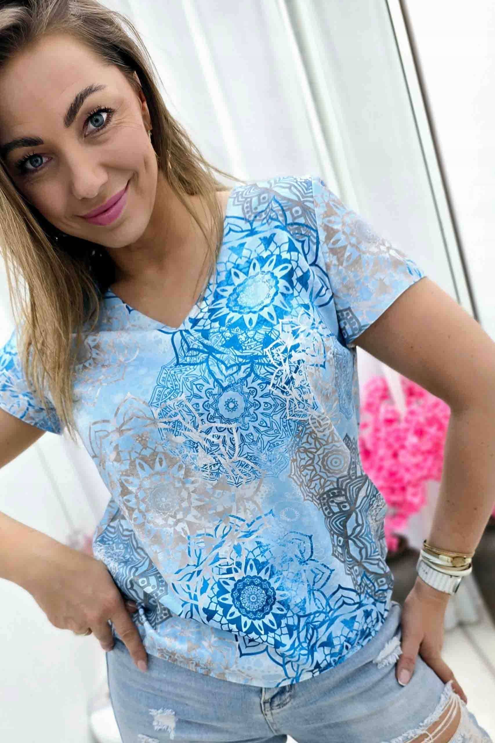 Dámská modrá halenka s krátkým rukávem Modrá krajka 40