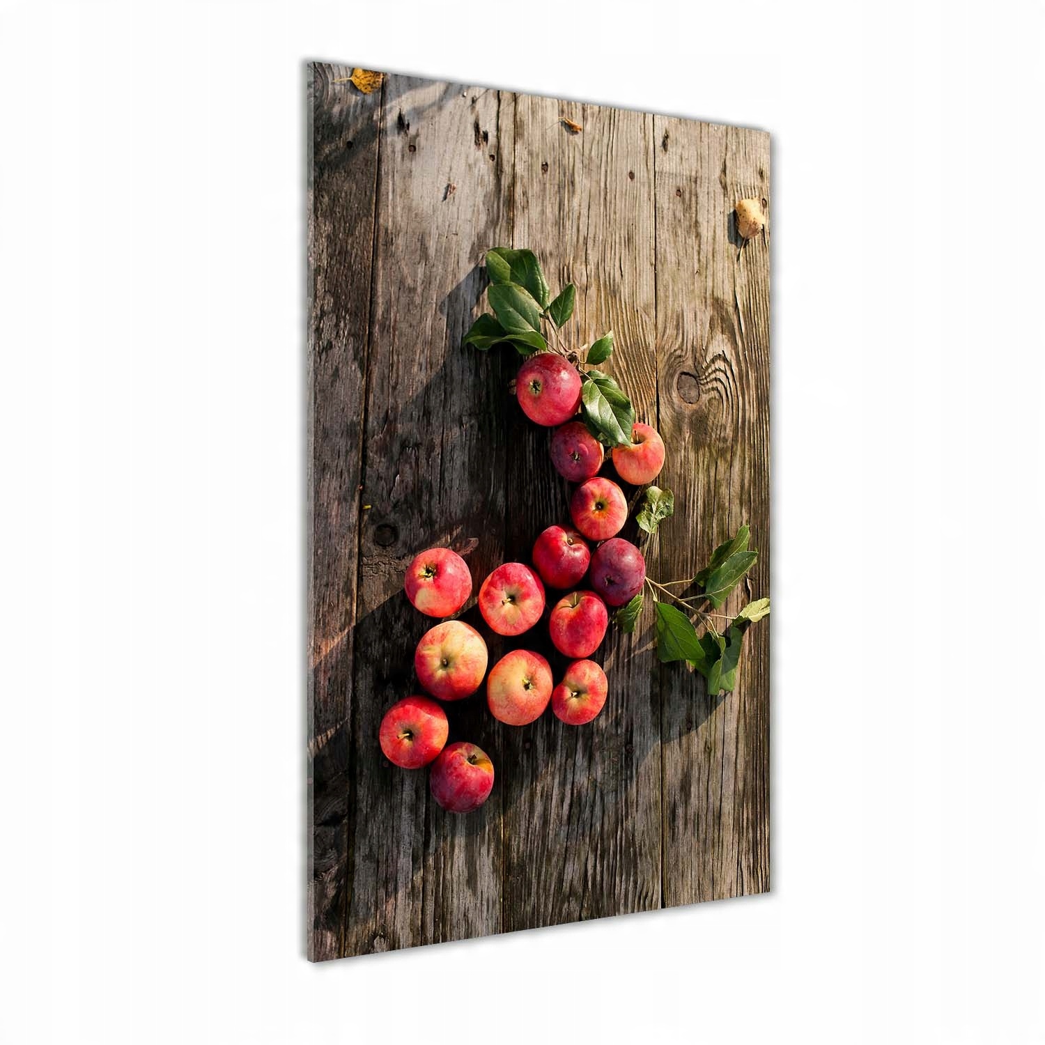 

Foto obraz na szkle pionowy Jabłka na stole 70x140