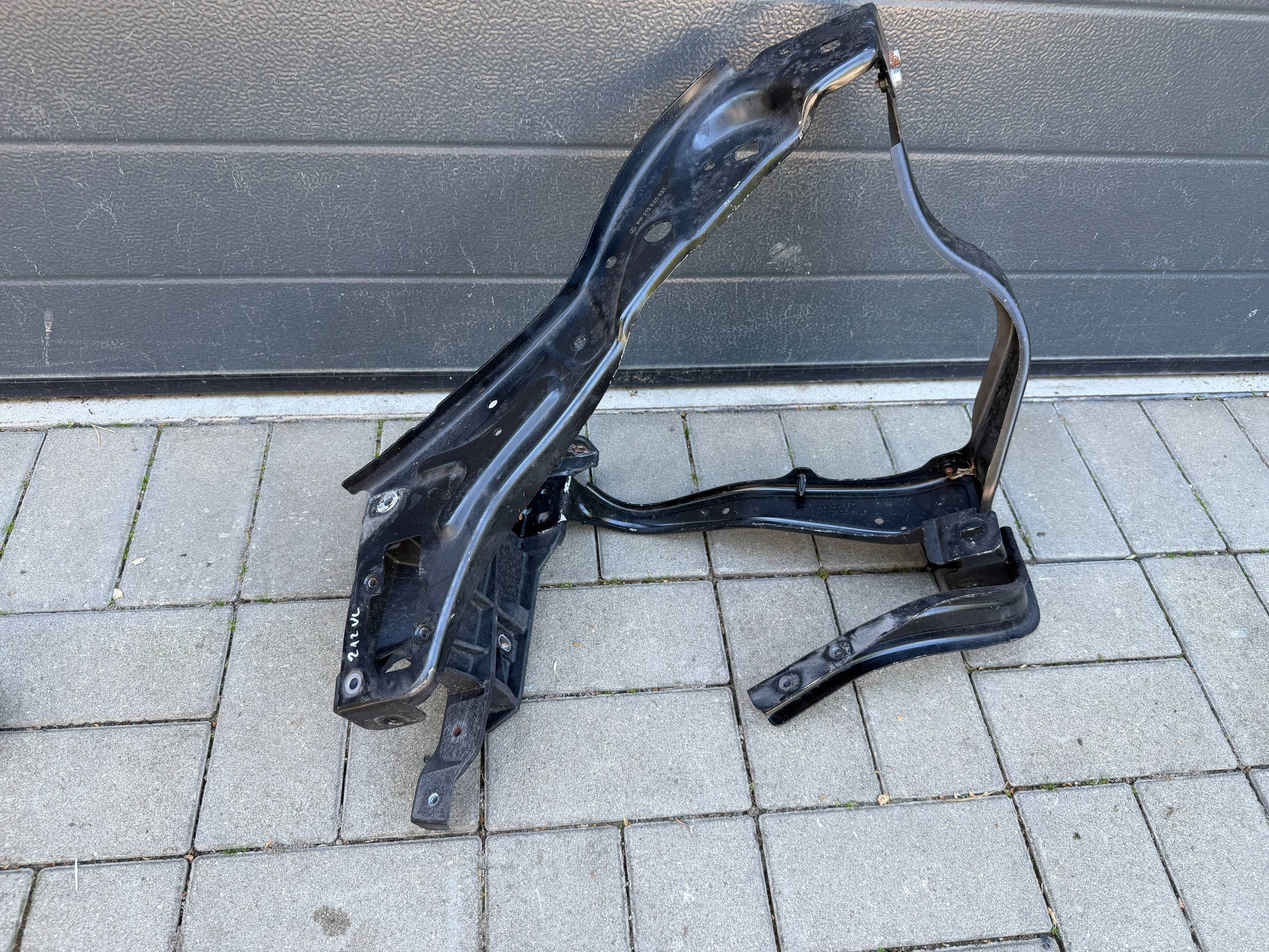 Mercedes E 212 headlight trim left front lights pillar iron