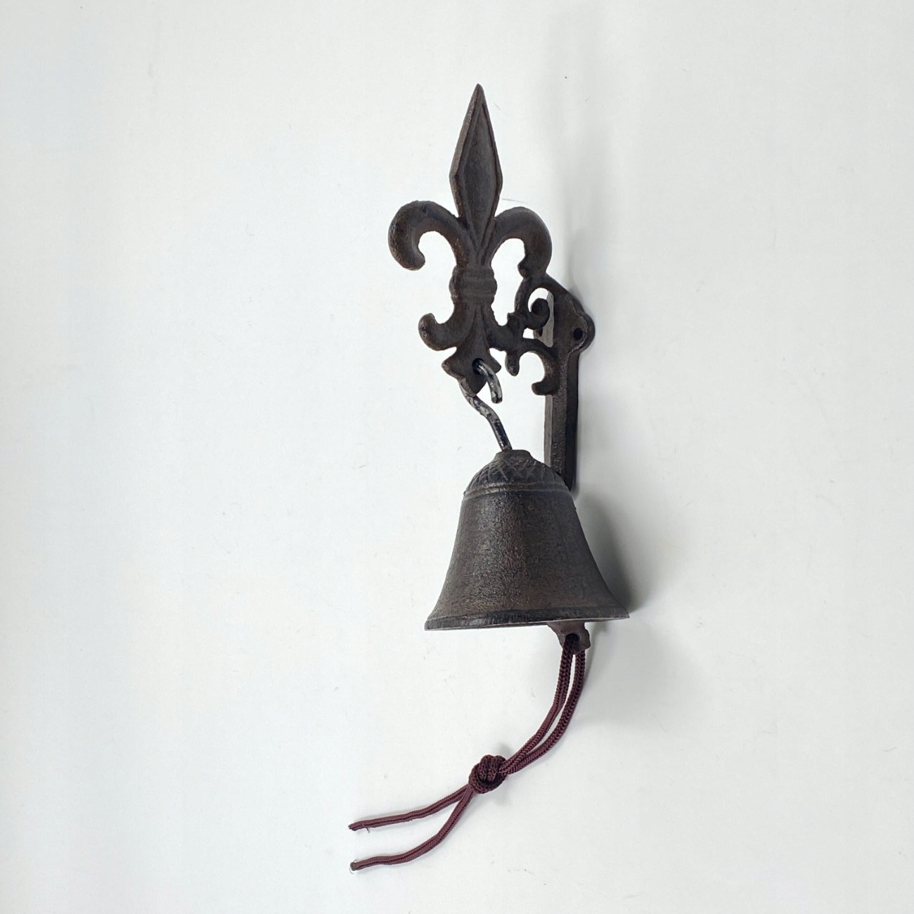 Żeliwny dzwonek ścienny 9x7x38 cm